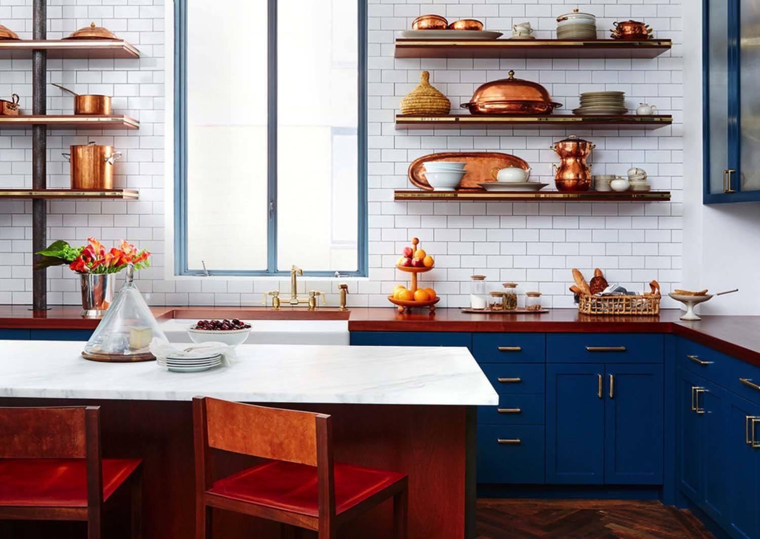 Kitchen with blue reddish counters, and open shelves