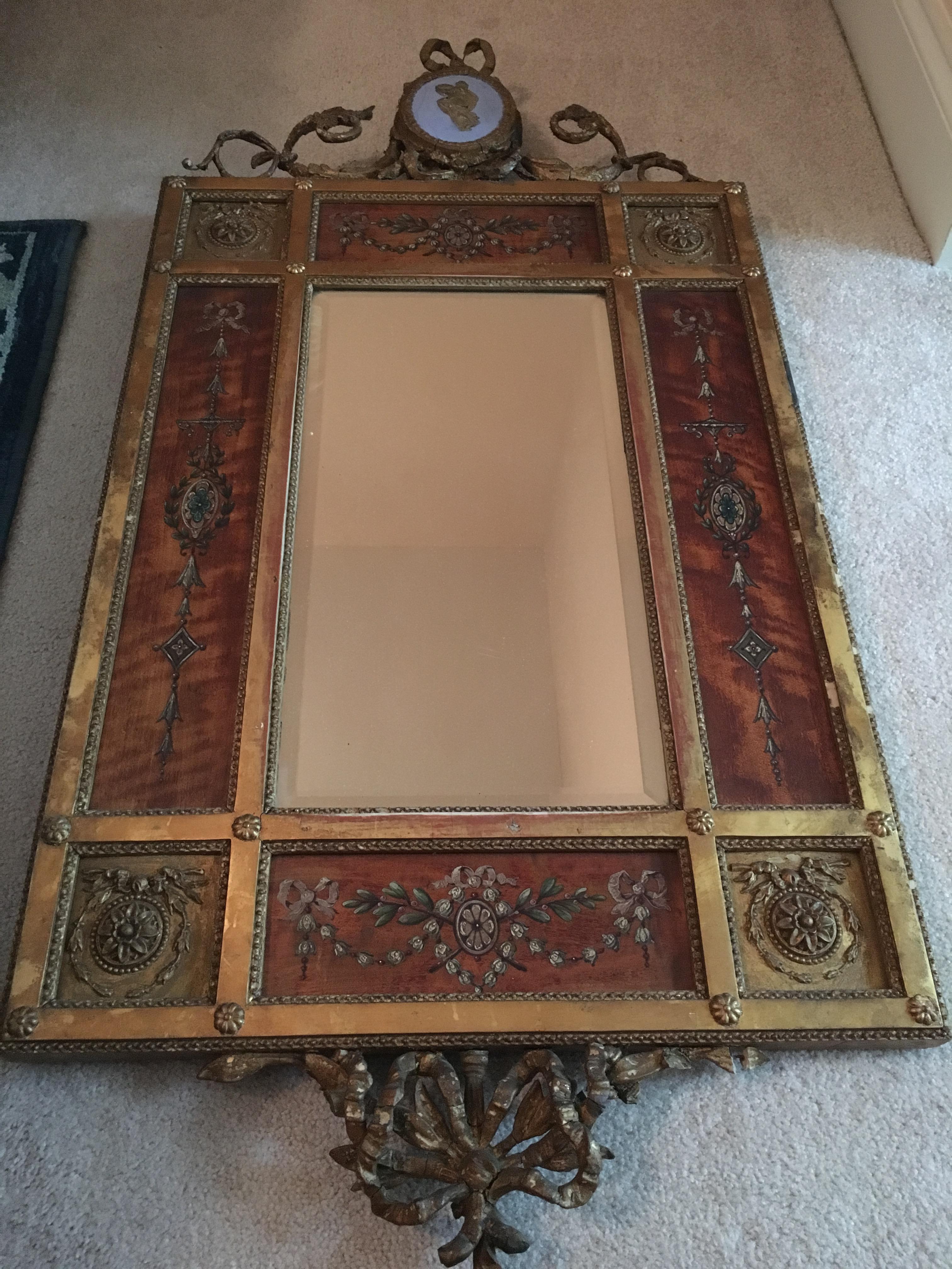Would love some help identifying this old mirror. Not sure of the age