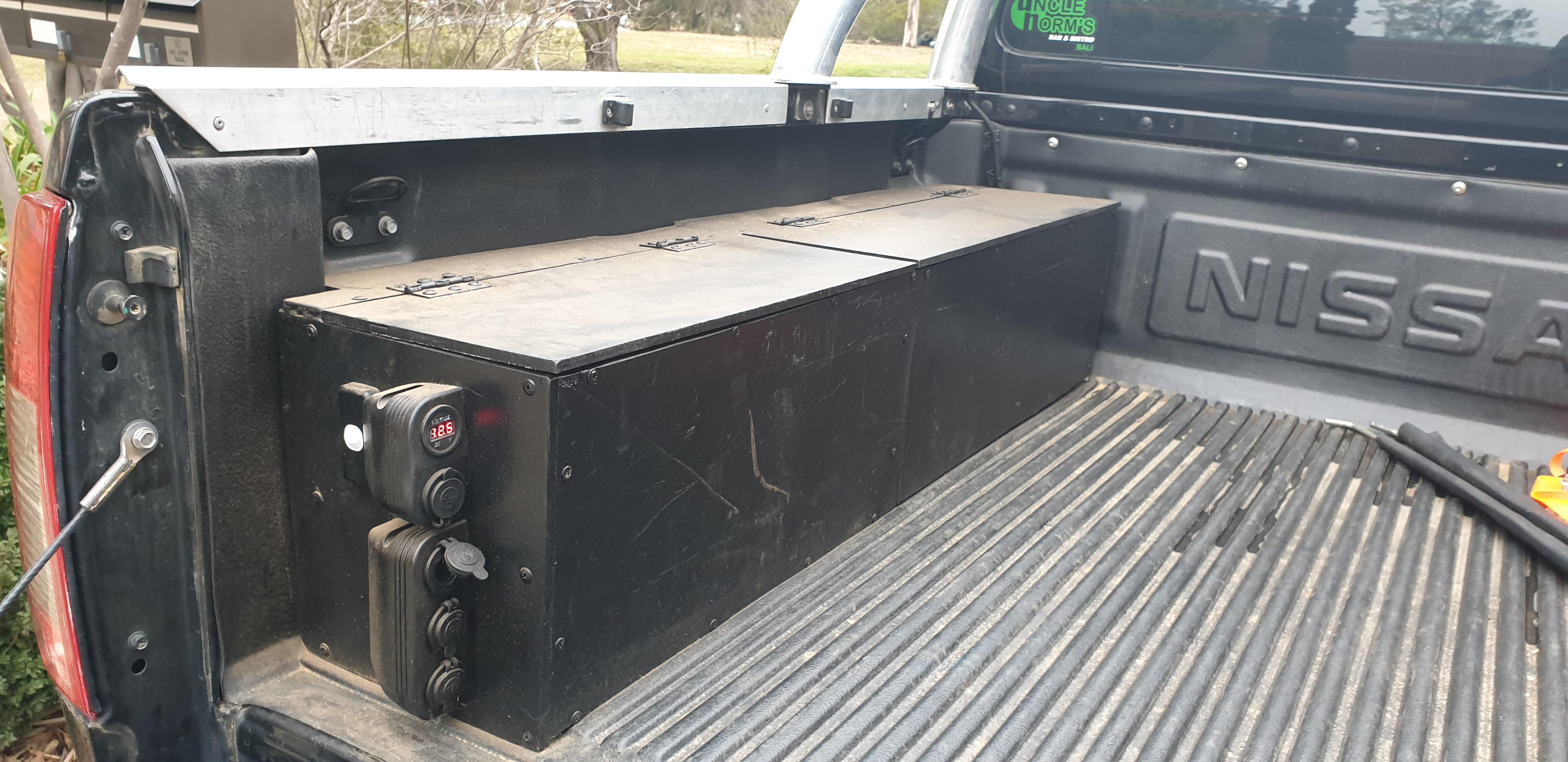 Built a custom dual battery/ storage box in the back of my tub r/nissanfrontier