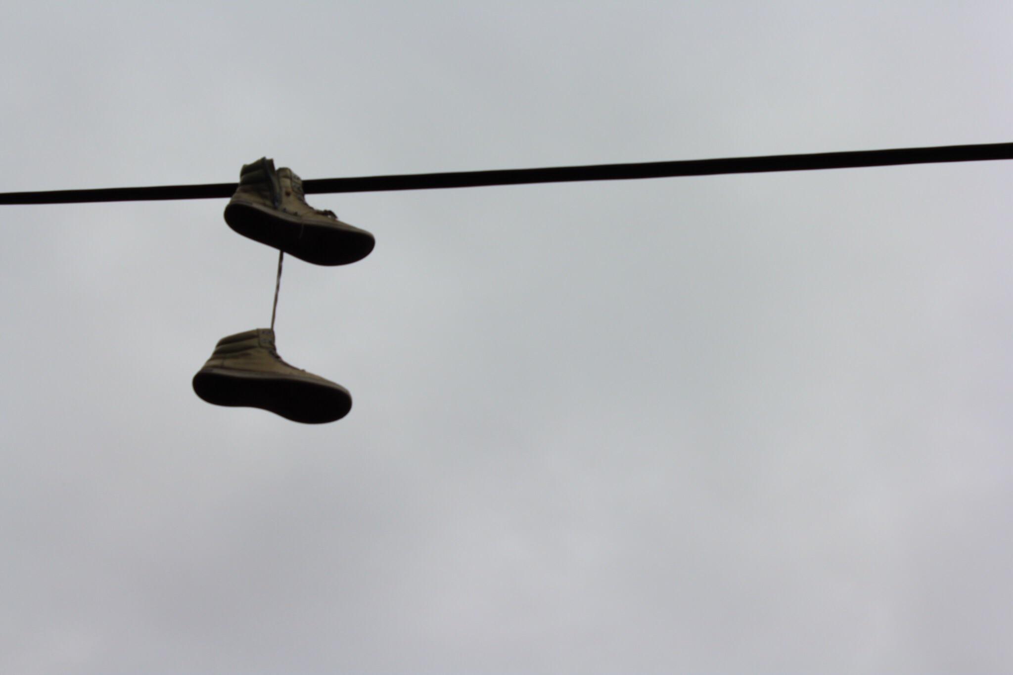 ITAP of shoes hanging from a telephone wire r/itookapicture