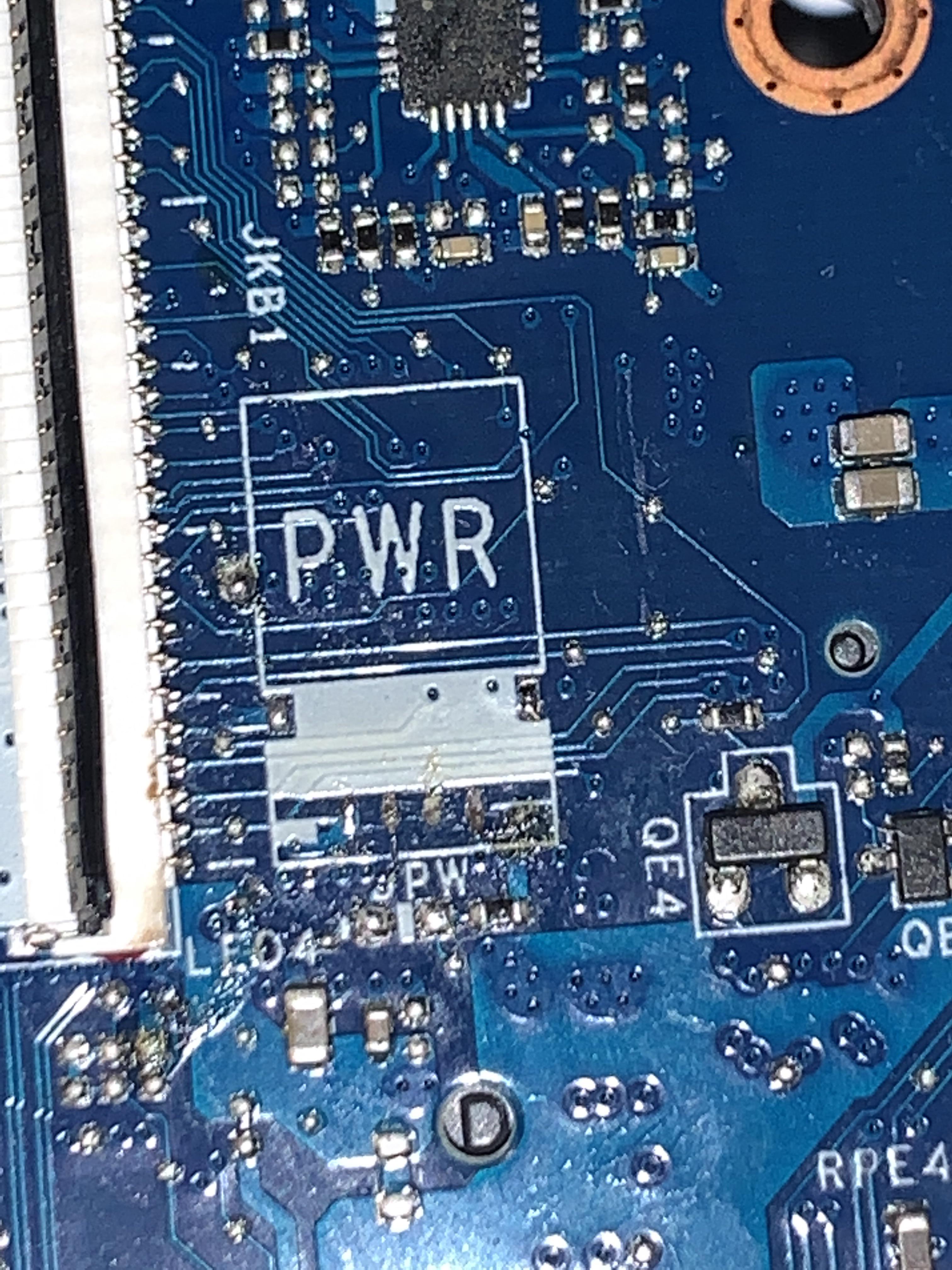 The ribbon cable connector from the power button to mobo broke off