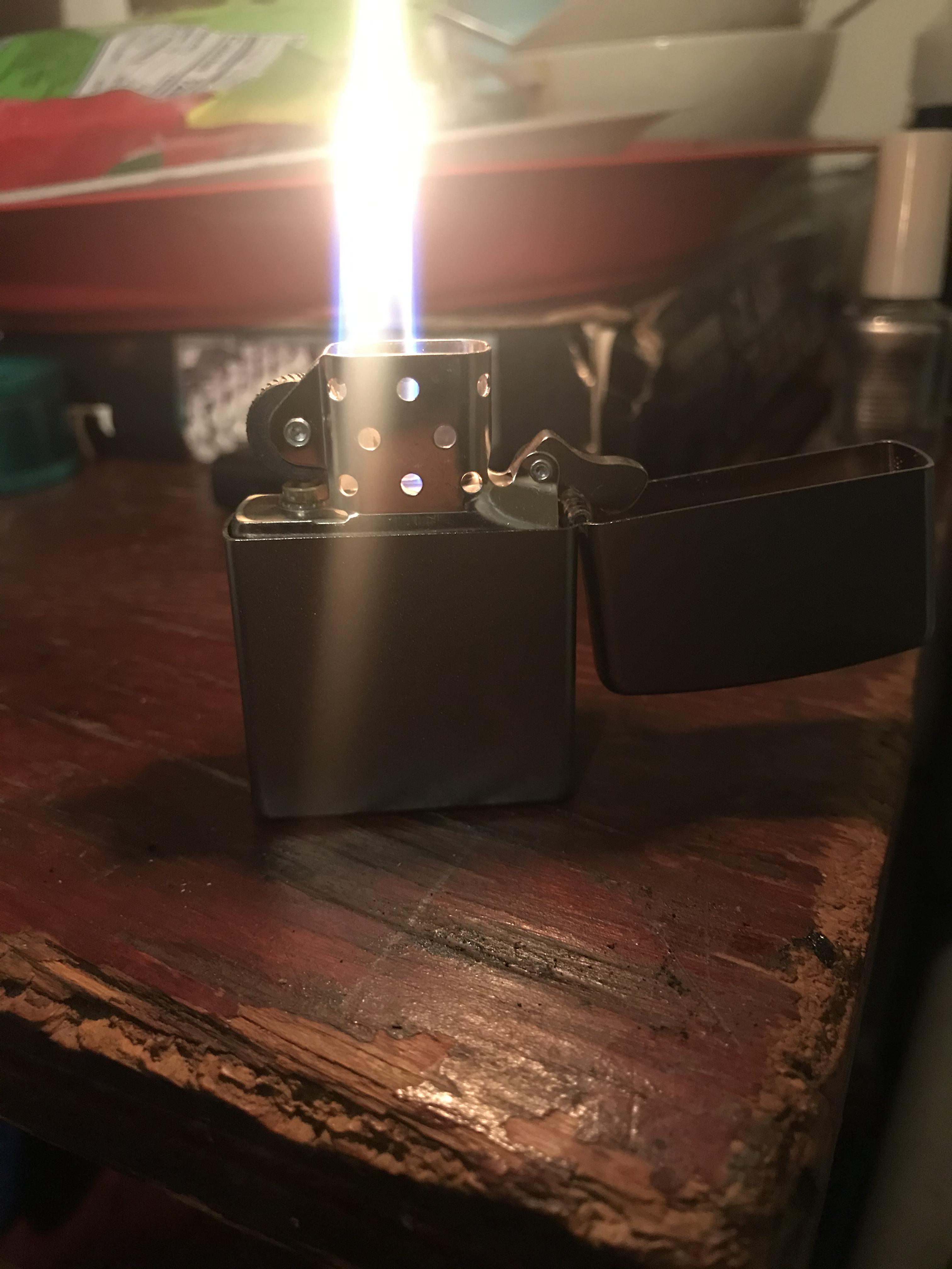 Im new to zippos, is it normal for my flame to be burning off center? r/Zippo