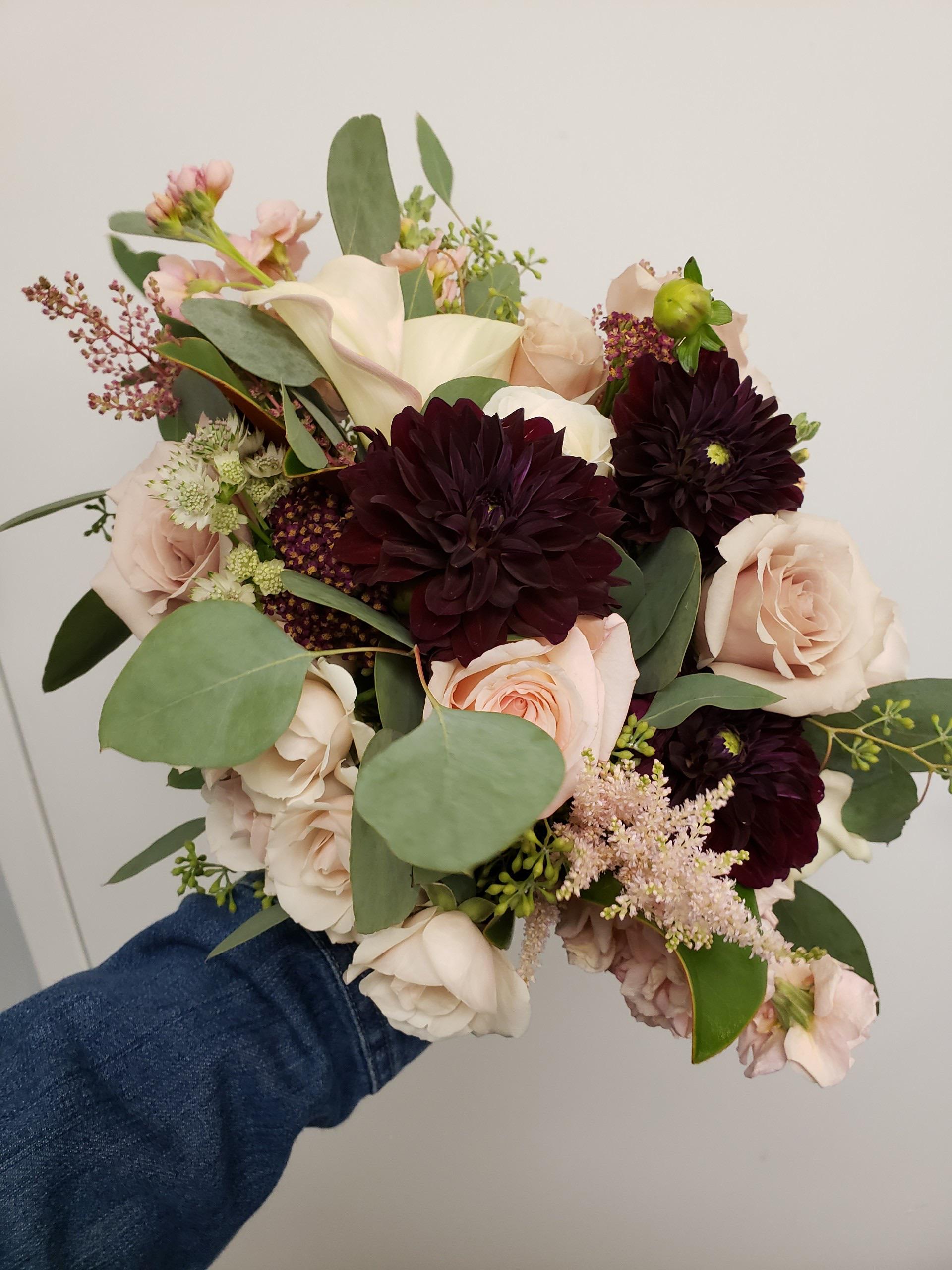 I have to share... my florist sent me a picture of my bridal bouquet