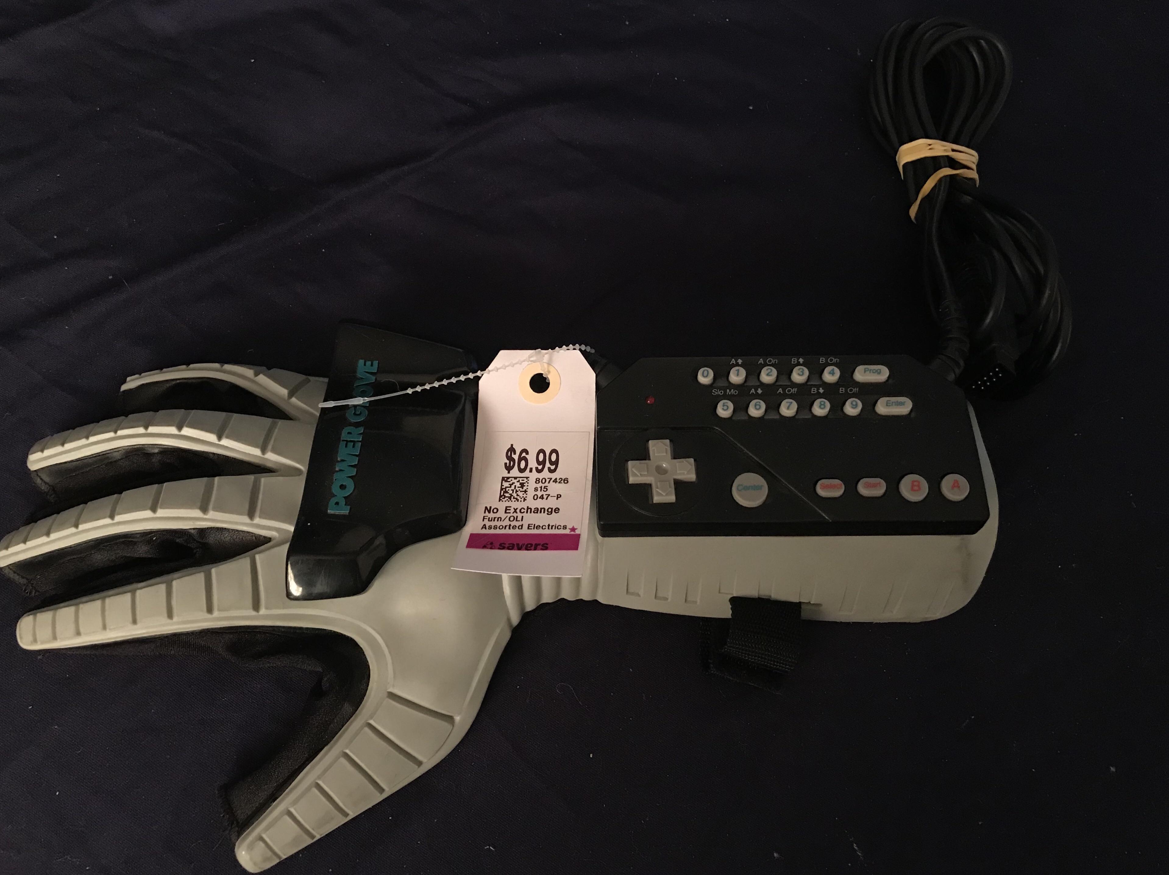 “I love the power glove... it’s so bad.” Found this at a local Savers
