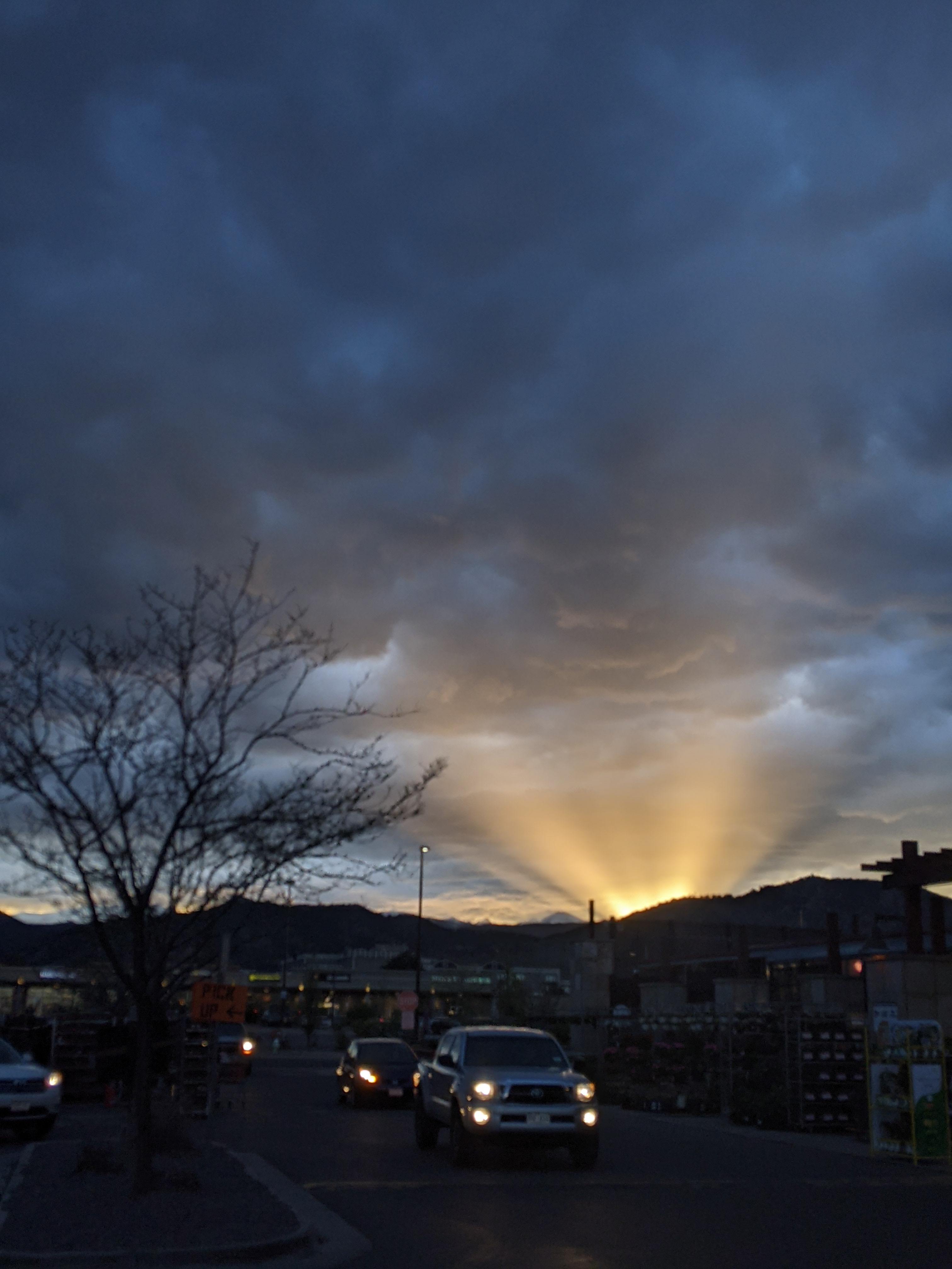 Sunset beams over Boulder (picture taken outside Home Depot). r/boulder
