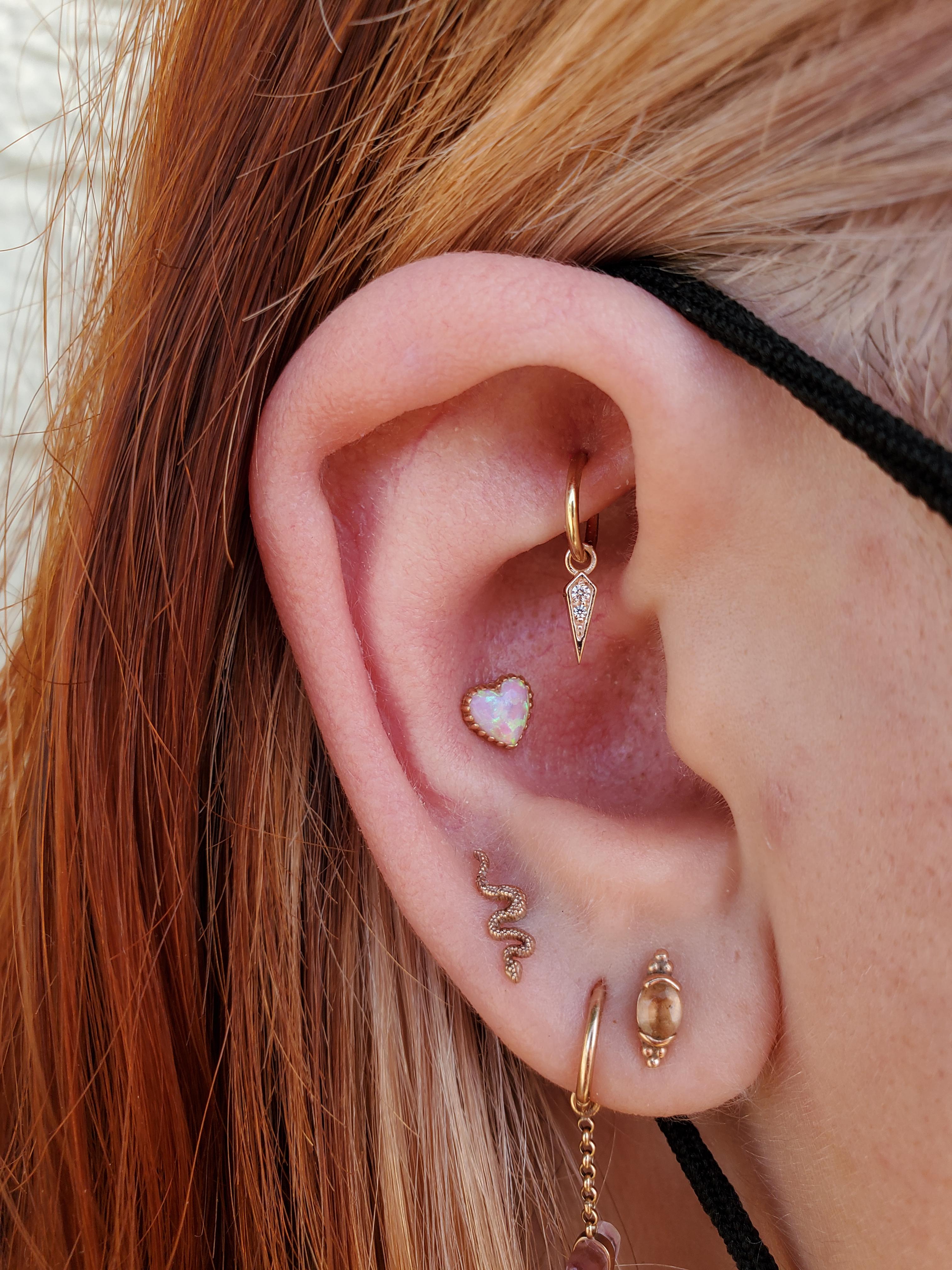 my current ear set up! ️ peach + pink tourmaline, white opal, & many
