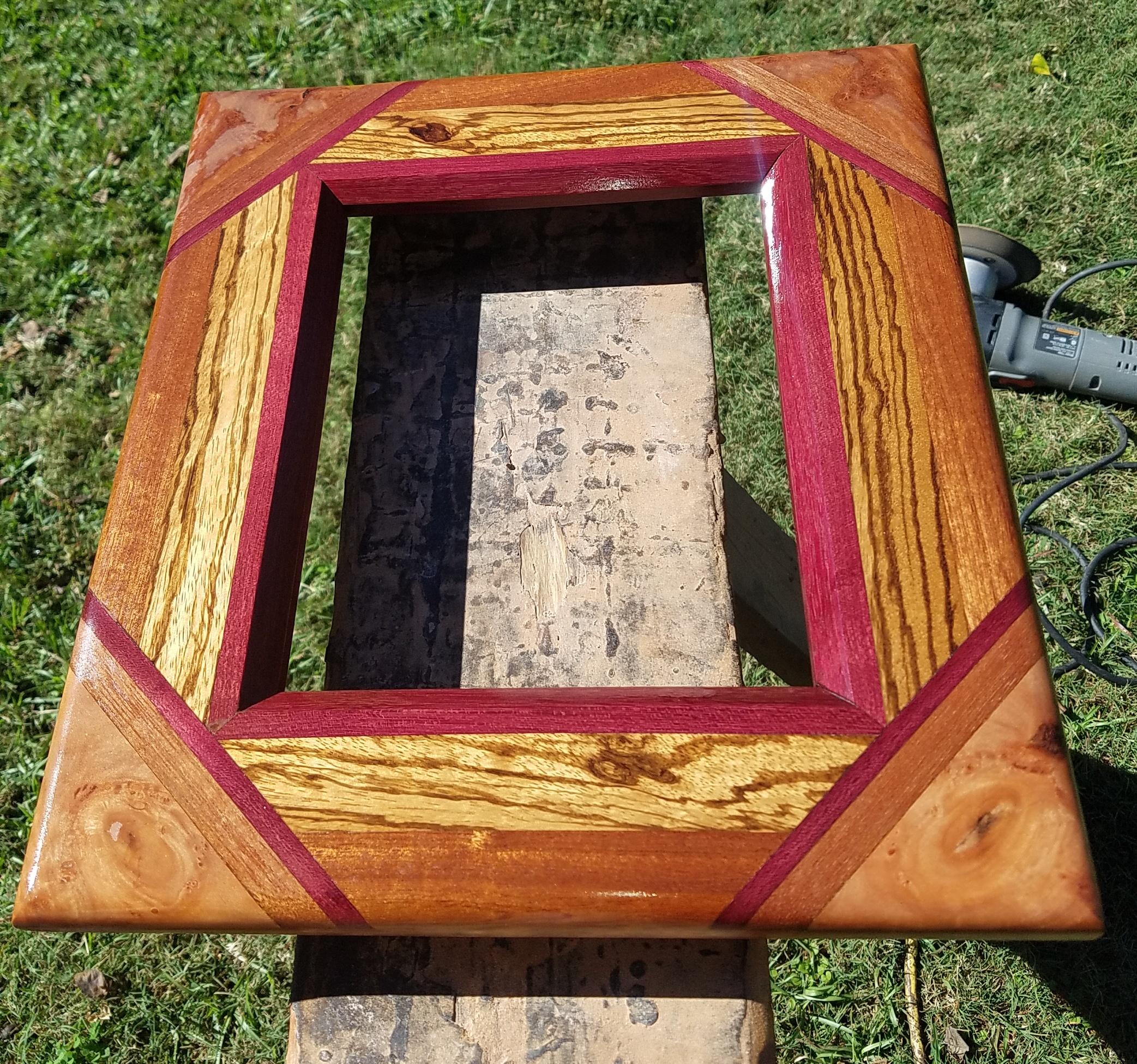 Mahogany, Purple Heart and Zebra Wood with Dogwood inlaid corners. r