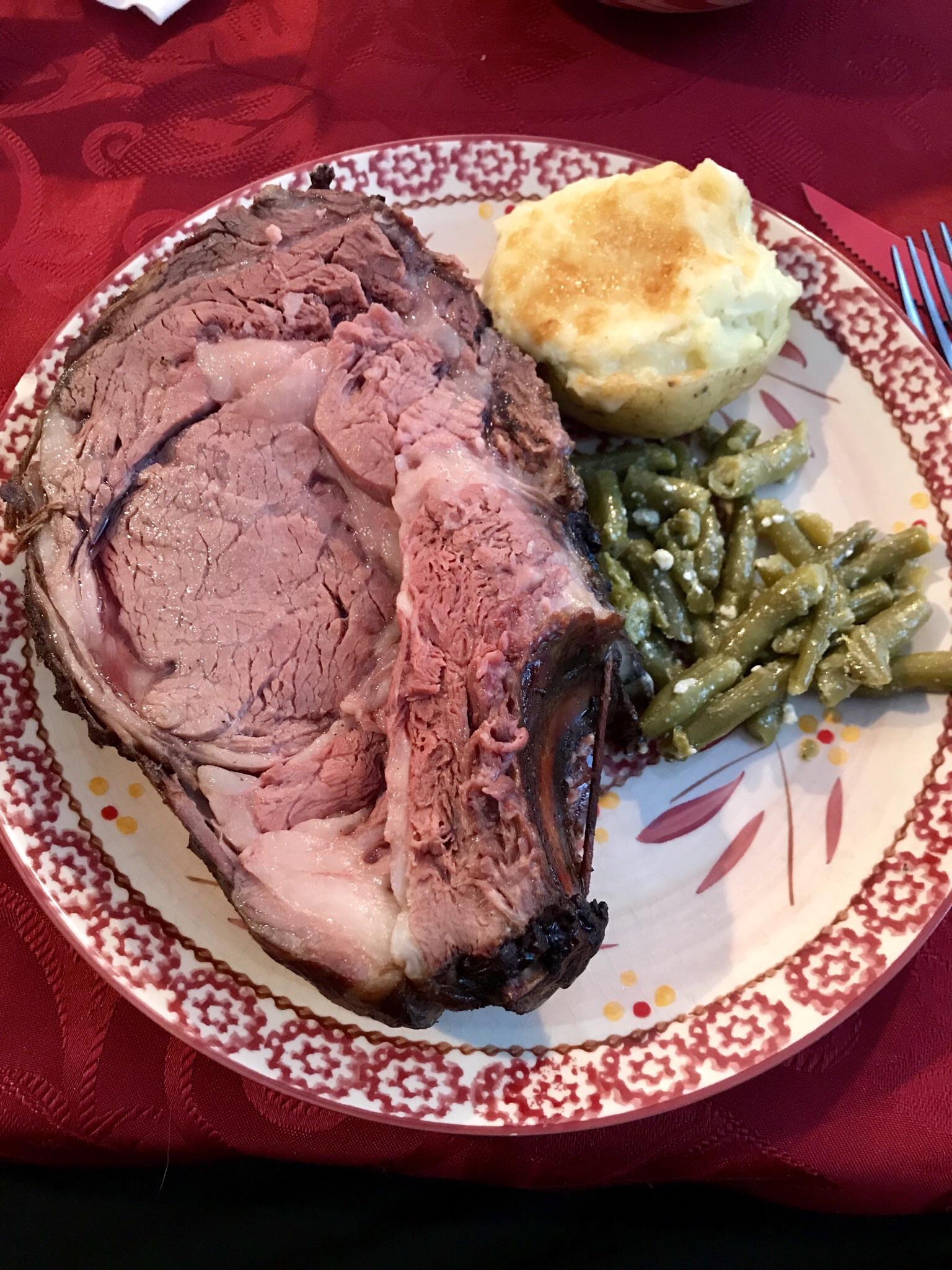 Here is my smoked prime rib with a twice baked potato and green beans