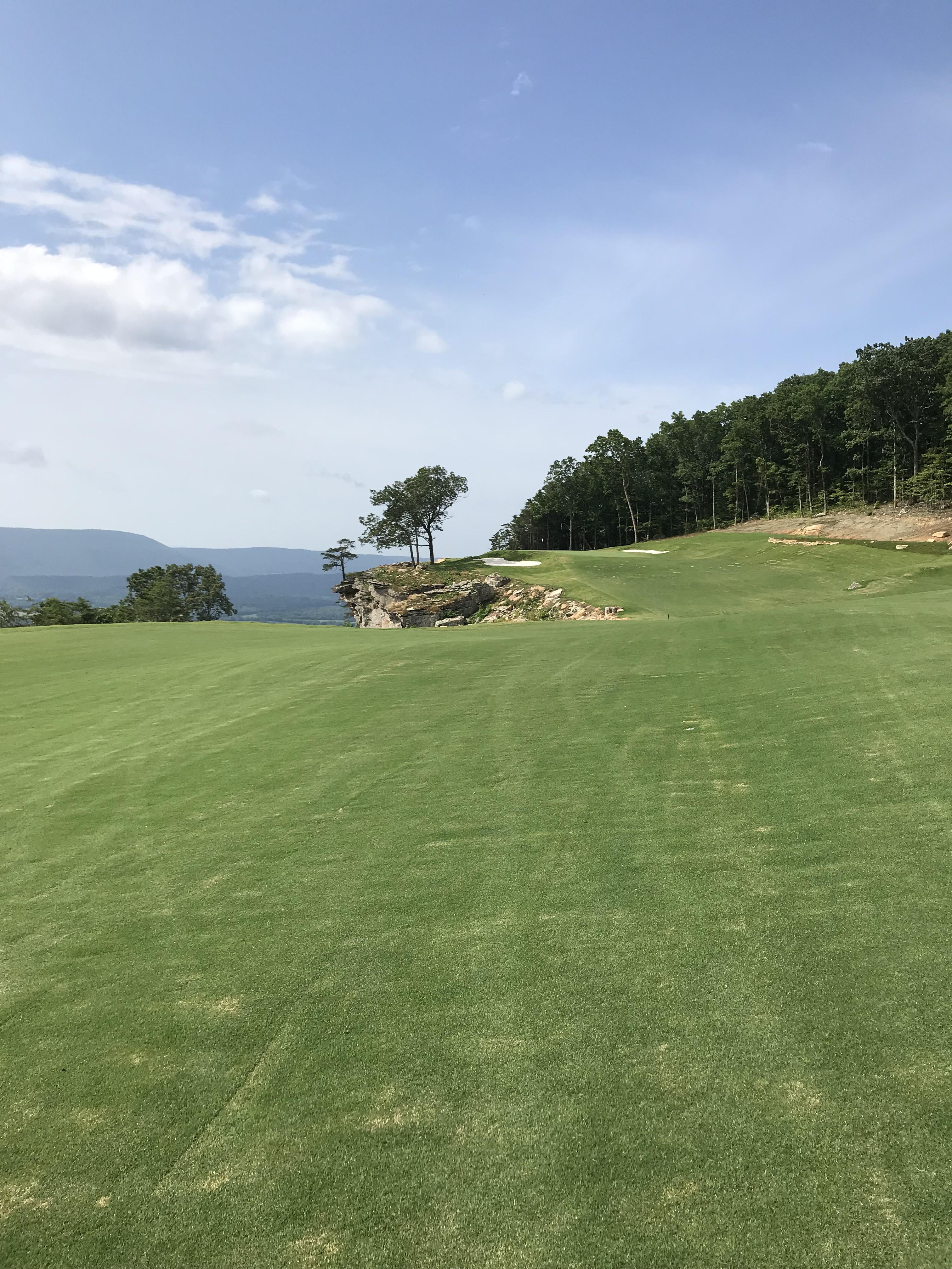 The approach shot of the 18th of the newly opened McLemore course in