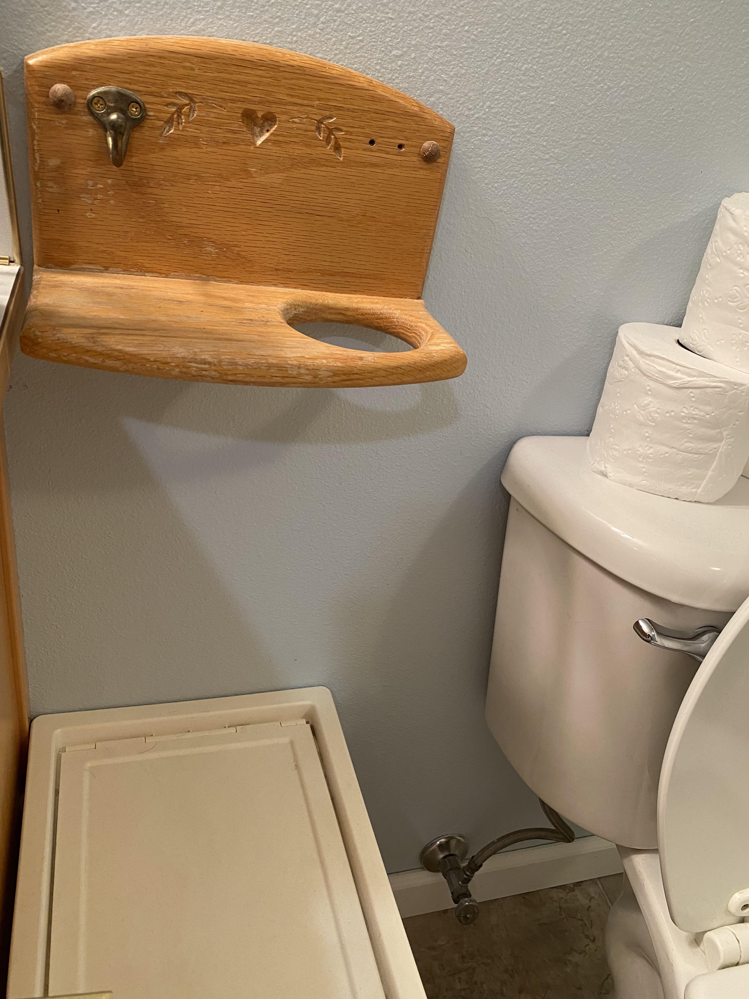 A wooden shelf beside the toilet in master bathroom. r/whatisthisthing