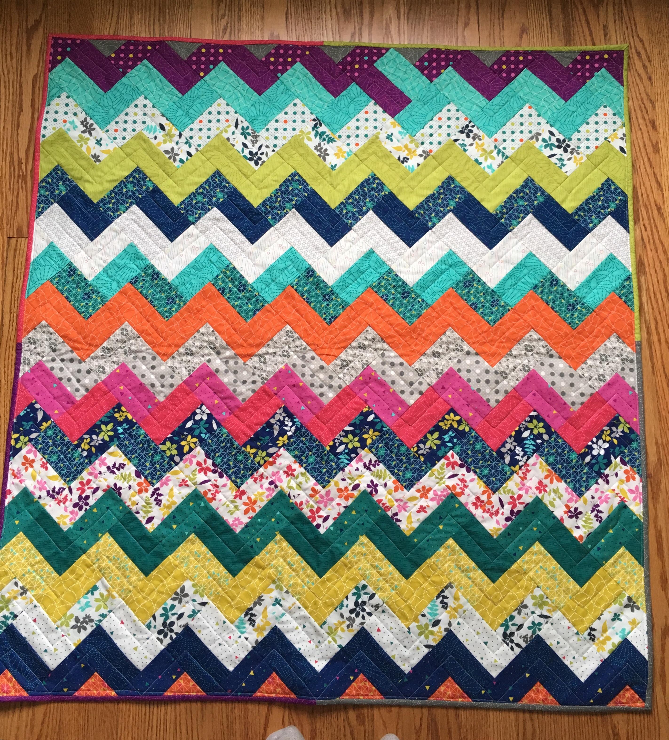 Finished my first full sized quilt (lap quilt) with one big mistake