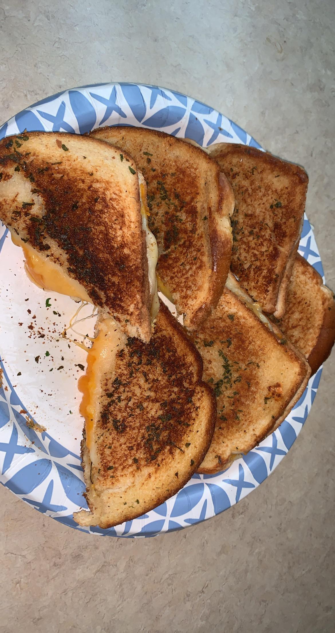 Provolone cheddar and American cheese garlic grilled cheese r