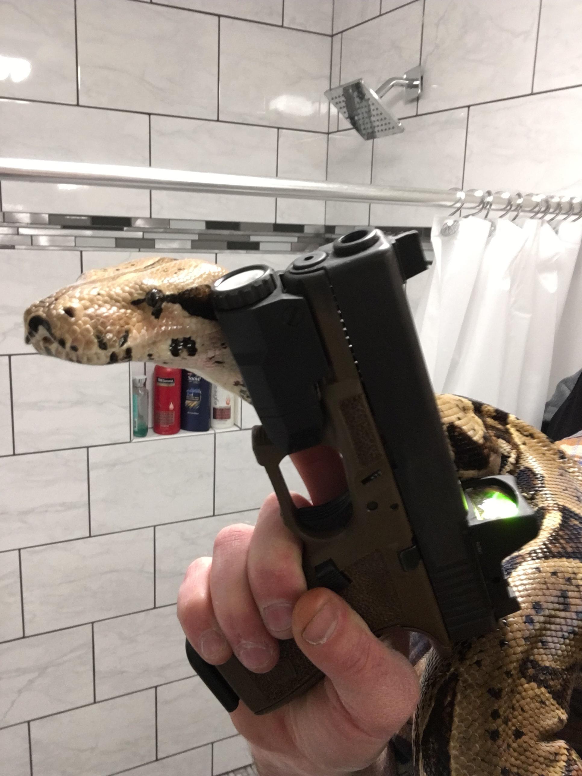 Because who doesn’t like big snakes and guns. Don’t worry, she’s empty