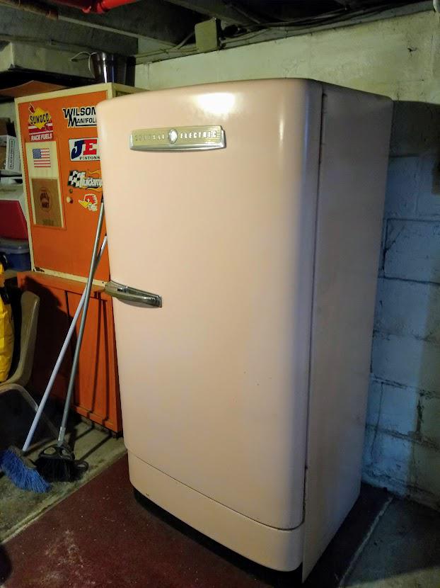 My dad's basement beer fridge. It's pinker in person. r/midcentury