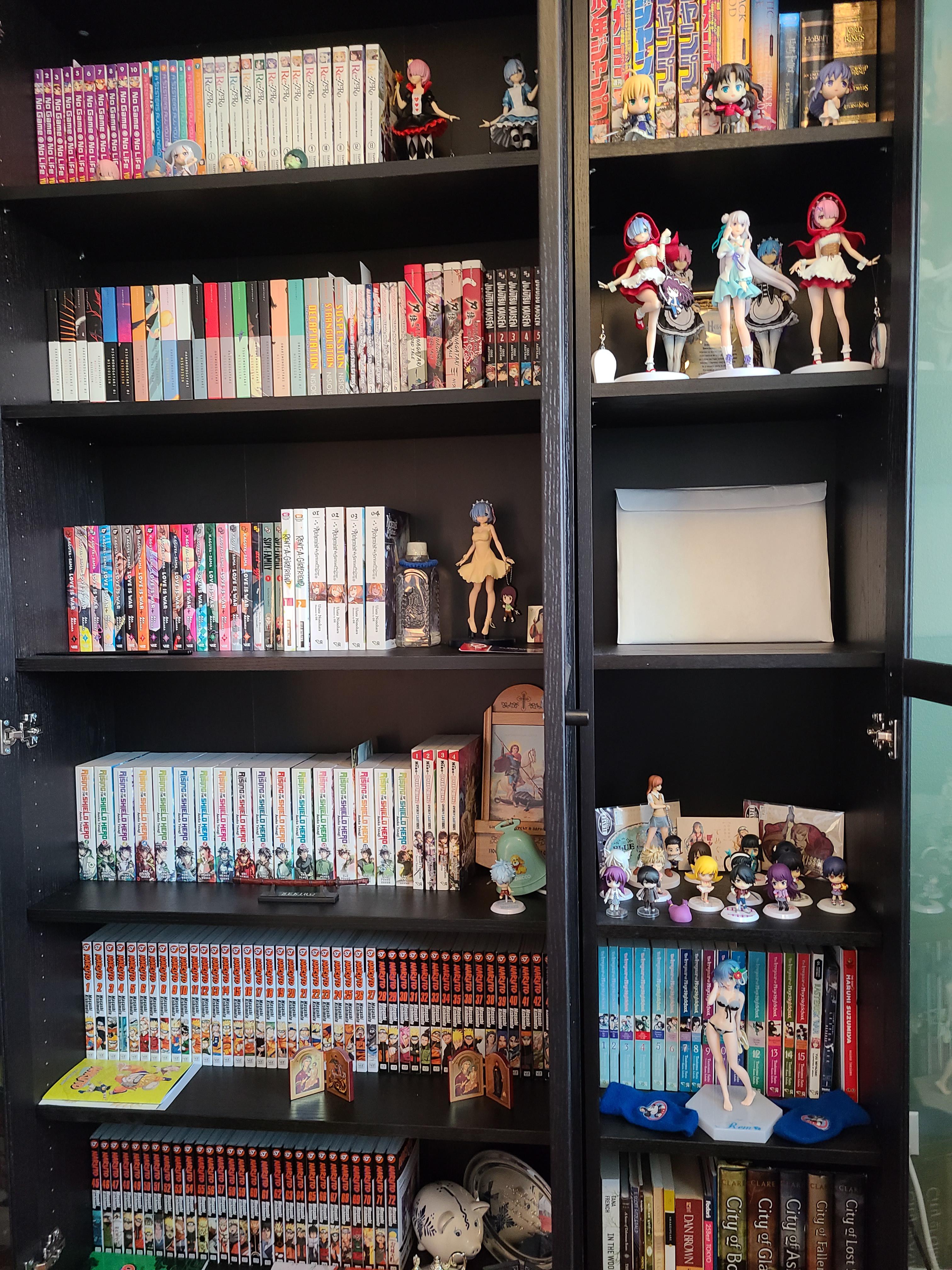 My current light novel/manga collection, spread out over two bookcases