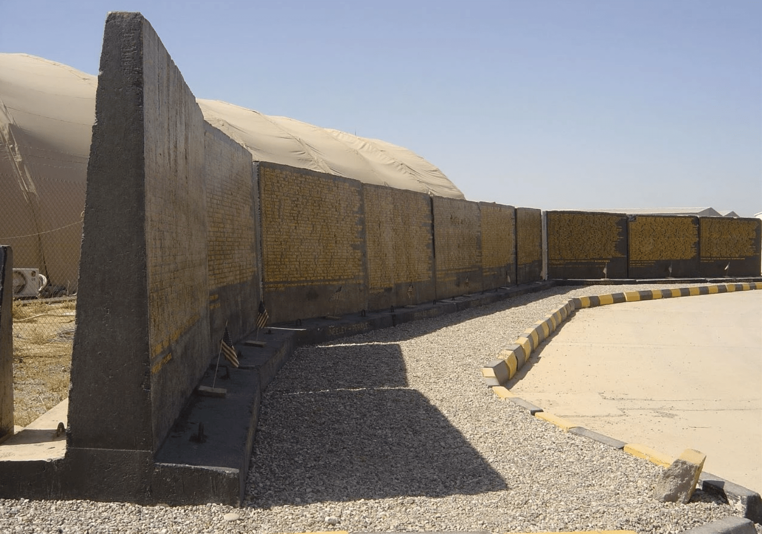 23 painted TWalls making up a memorial maintained by US Troops at Camp