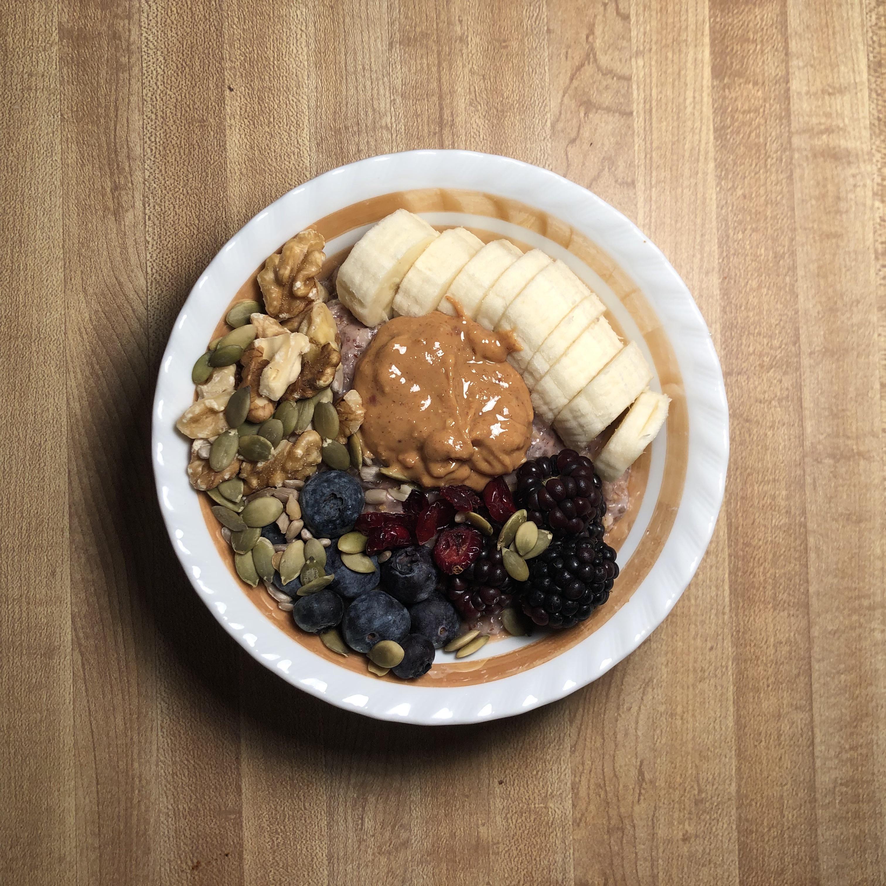 Oats cooked in almond milk with chia, flax, cinnamon and turmeric. Then