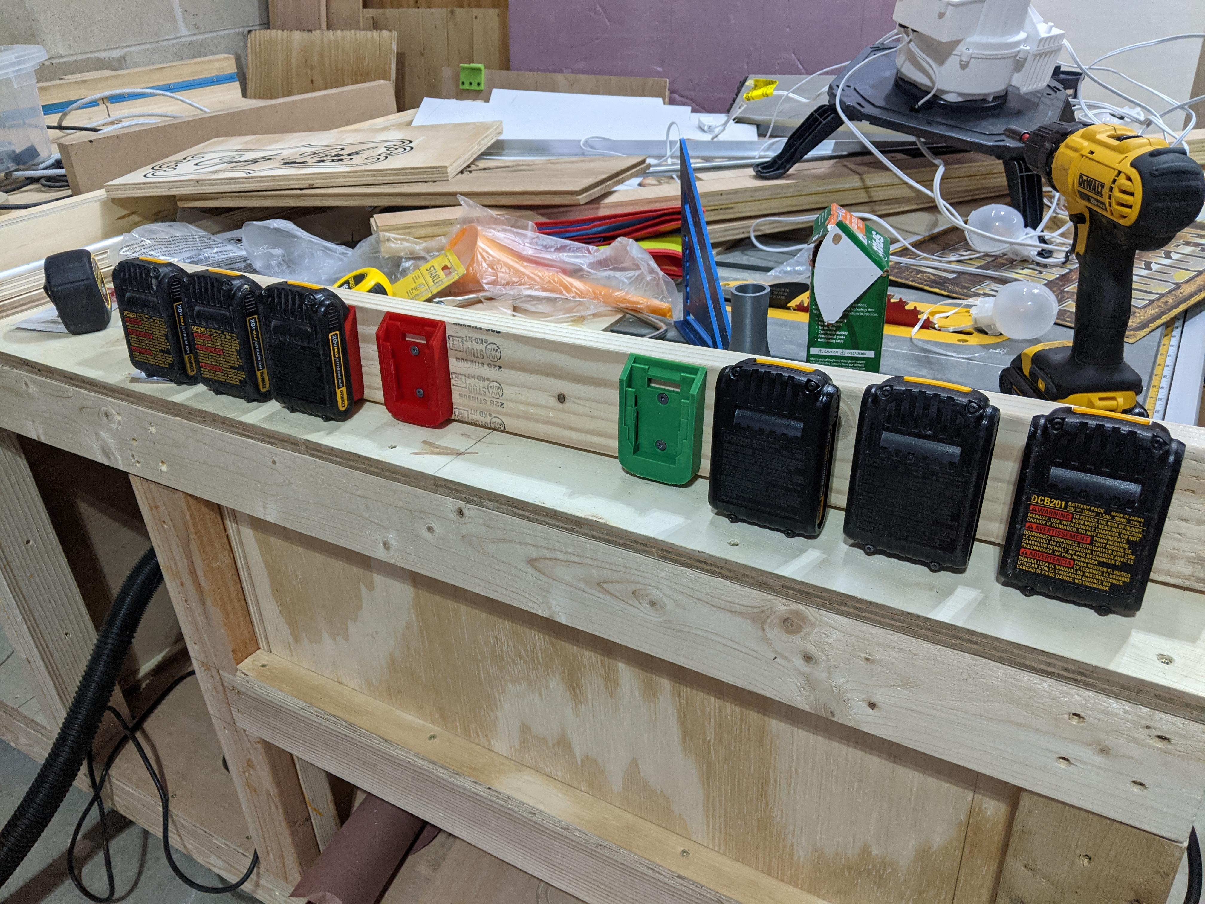 Charging board for charged (green) and uncharged (red) batteries