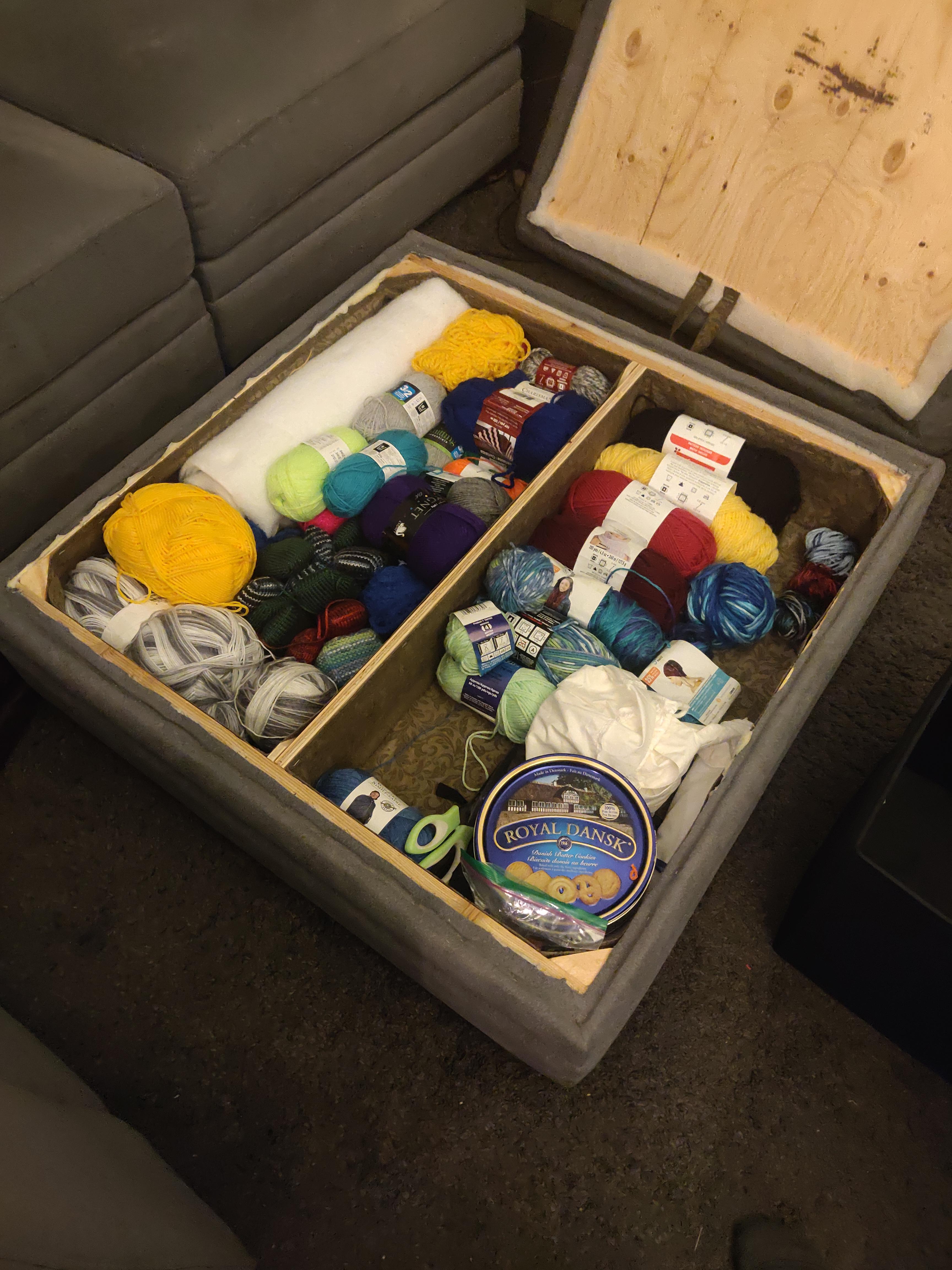 DIY'd our ottoman into a storage ottoman, moved all my yarn into it and