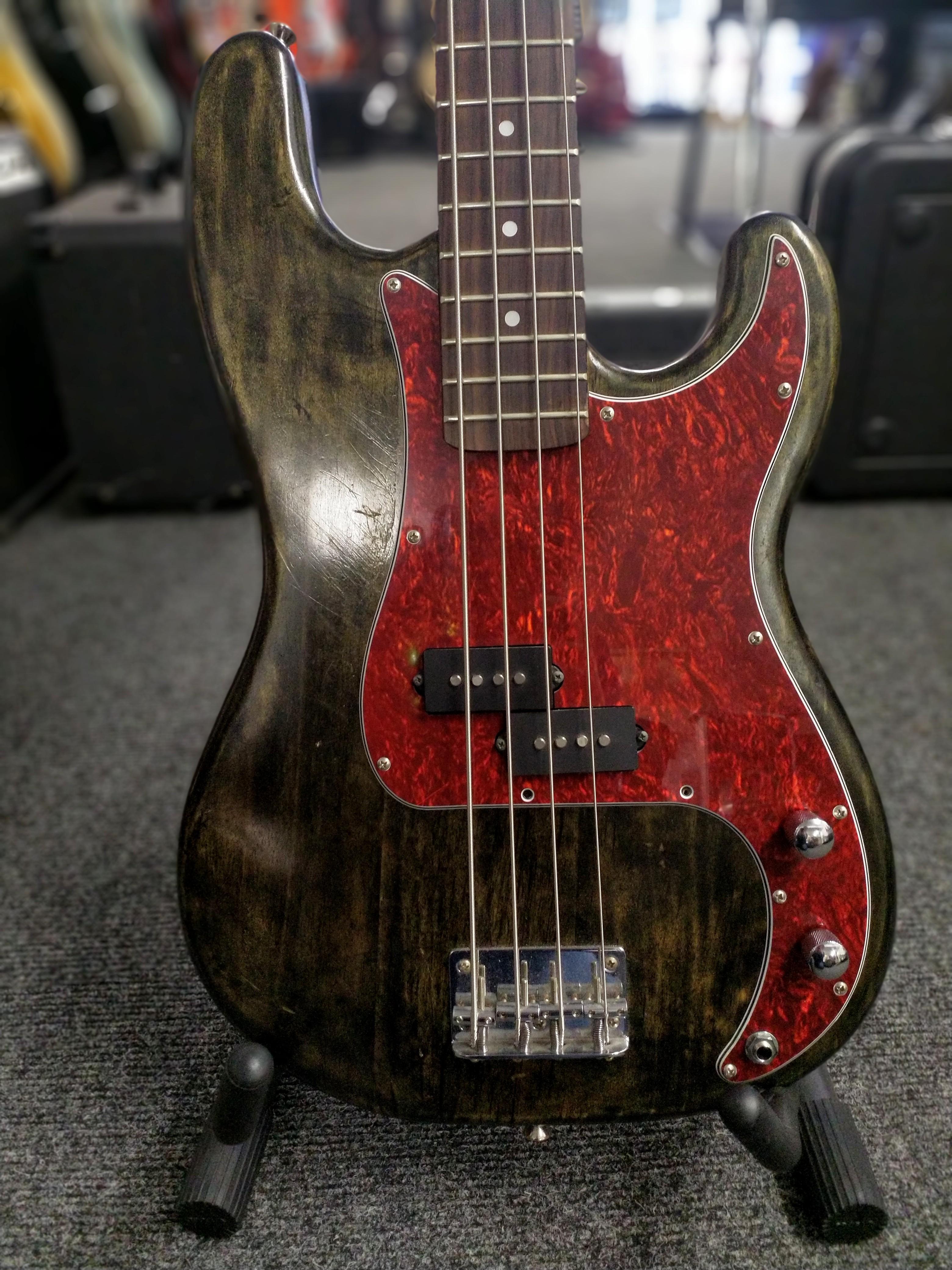 I bought a cheap bass, stained it with black blotting ink and finished it with truoil. r/Luthier