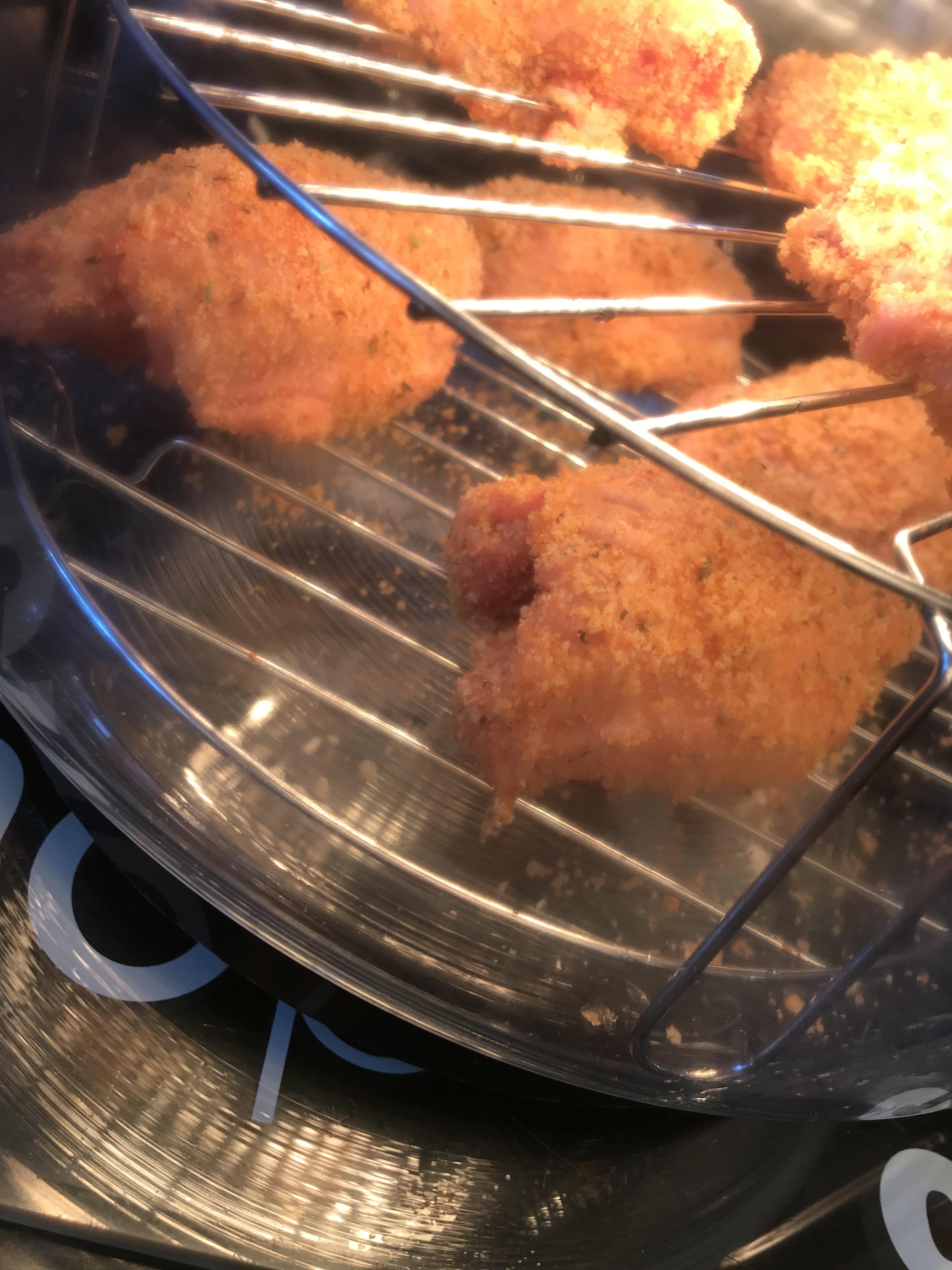 Air fried chicken thighs with almond flour and Parmesan fell off the