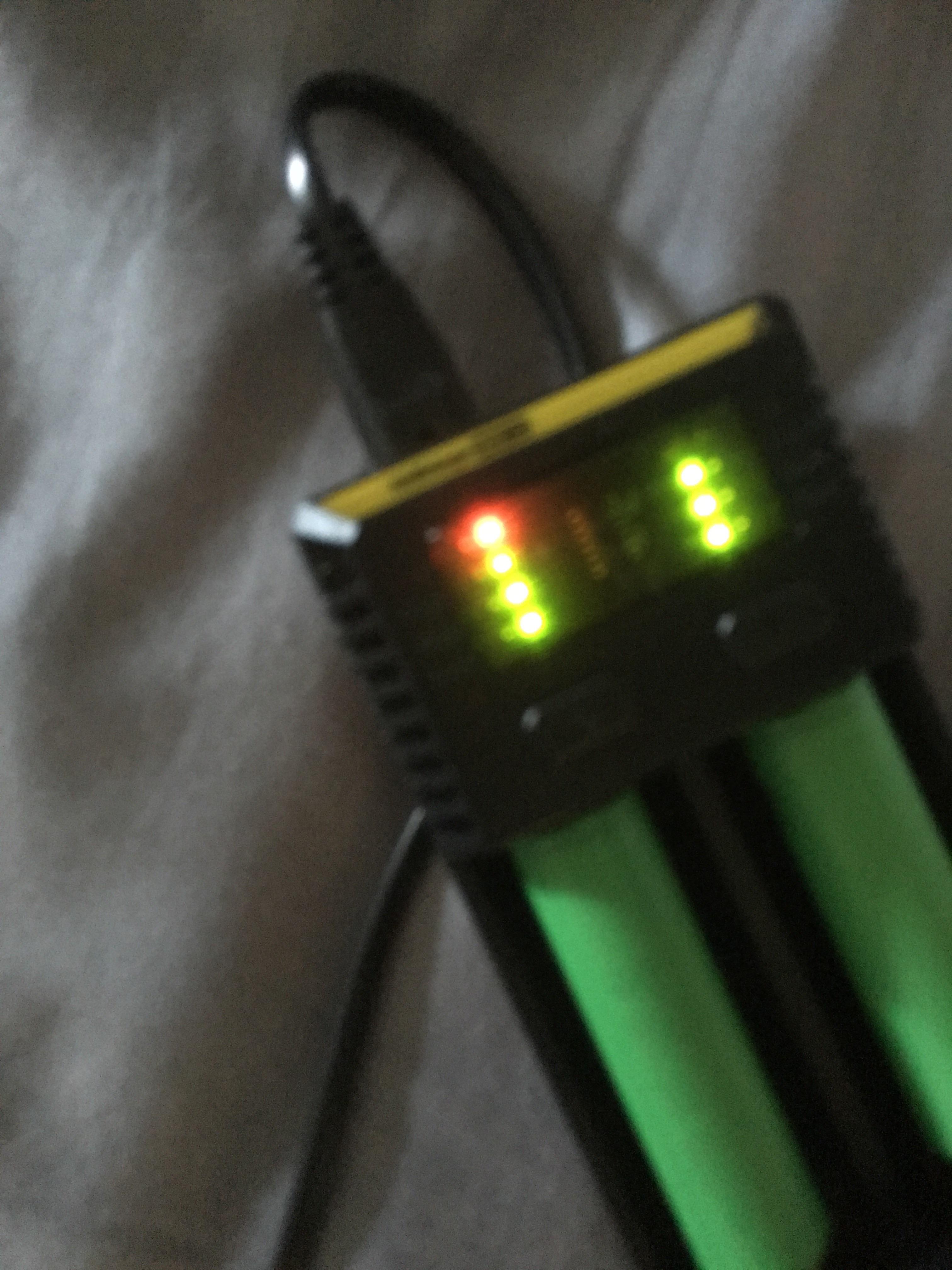 What does the red light mean? The right battery is done, the left one
