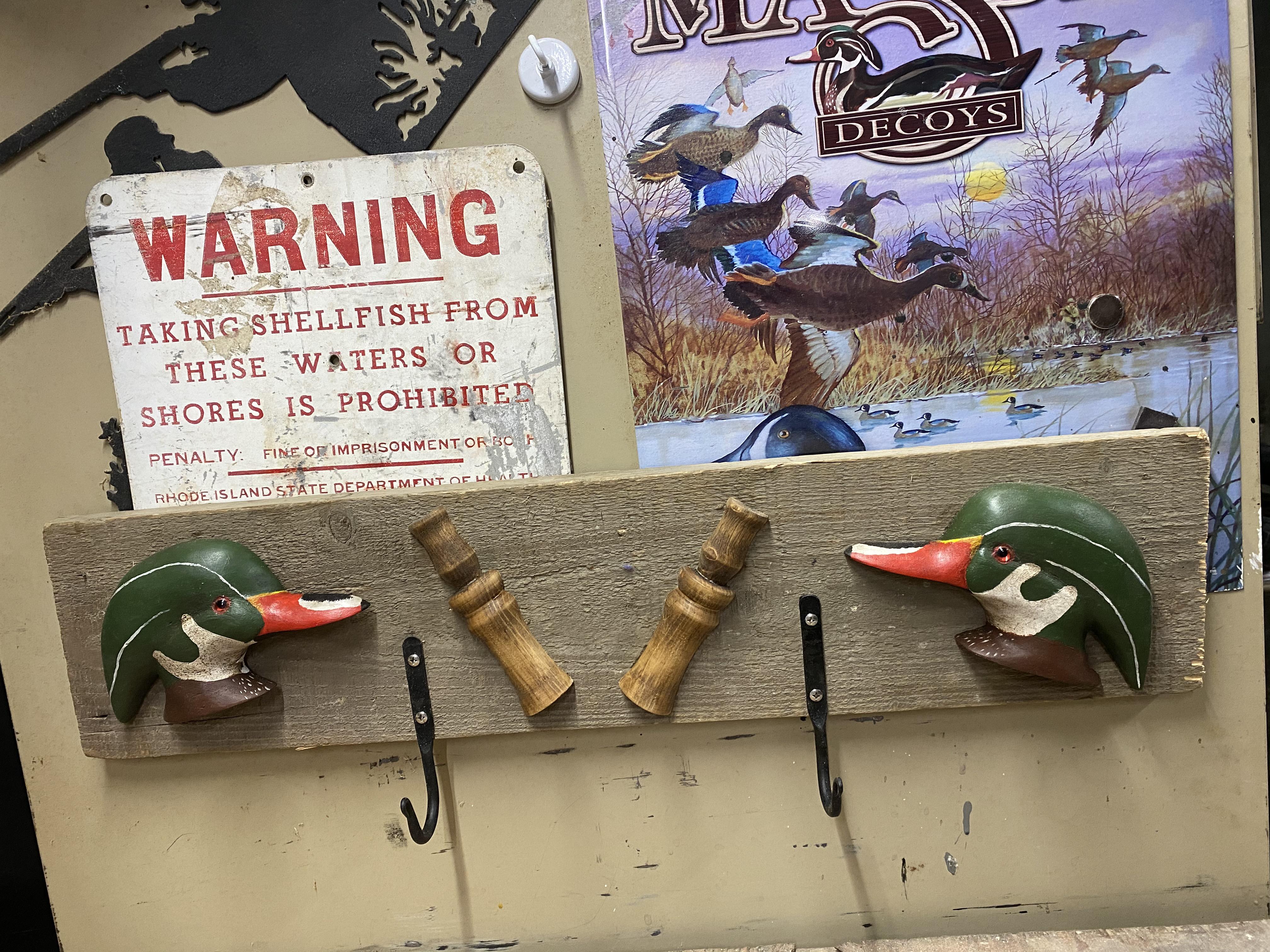 Finished a coat rack today. Carved the duck heads and turned the call