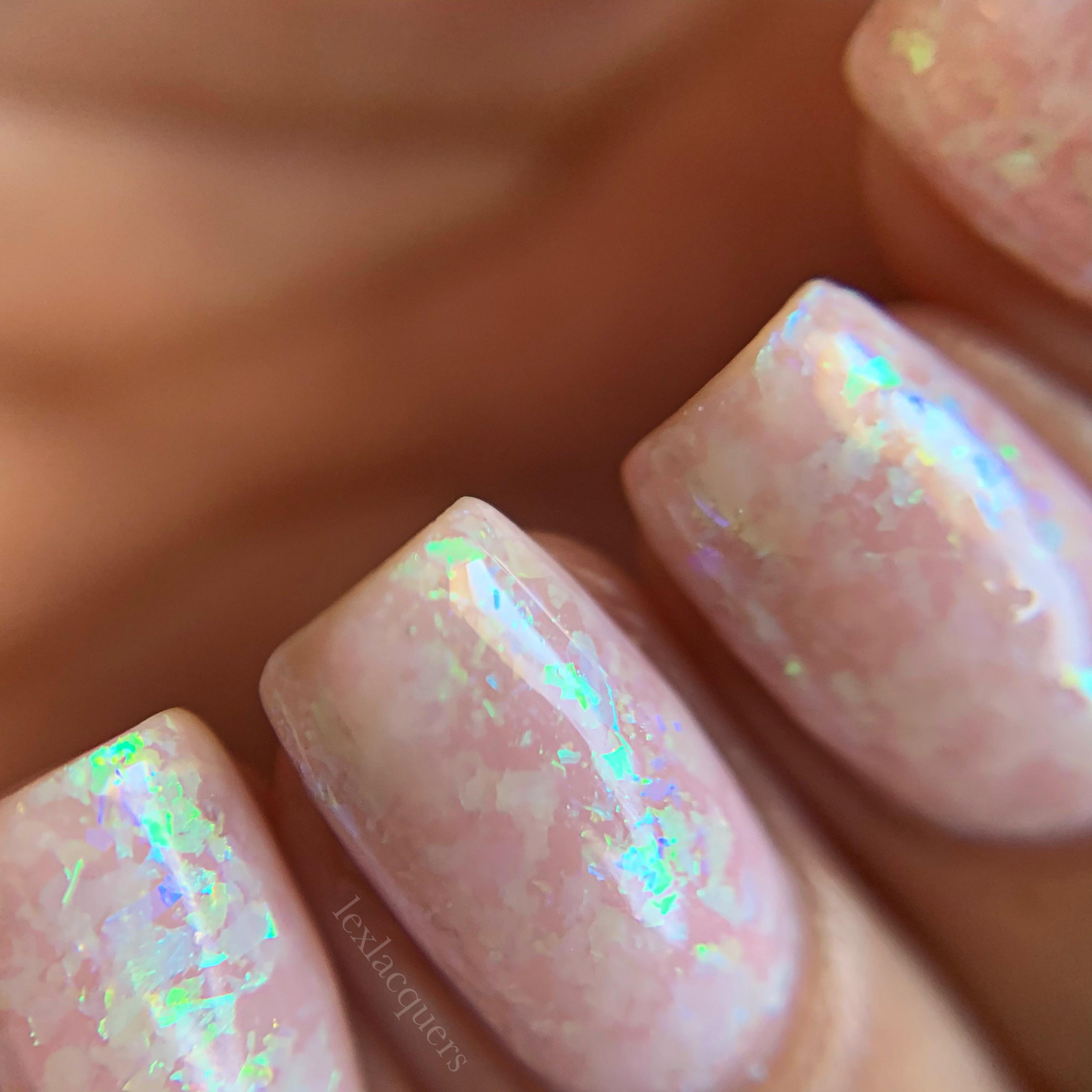 Multiple coats of OPI Bubble Bath (gel) with some chameleon flakes