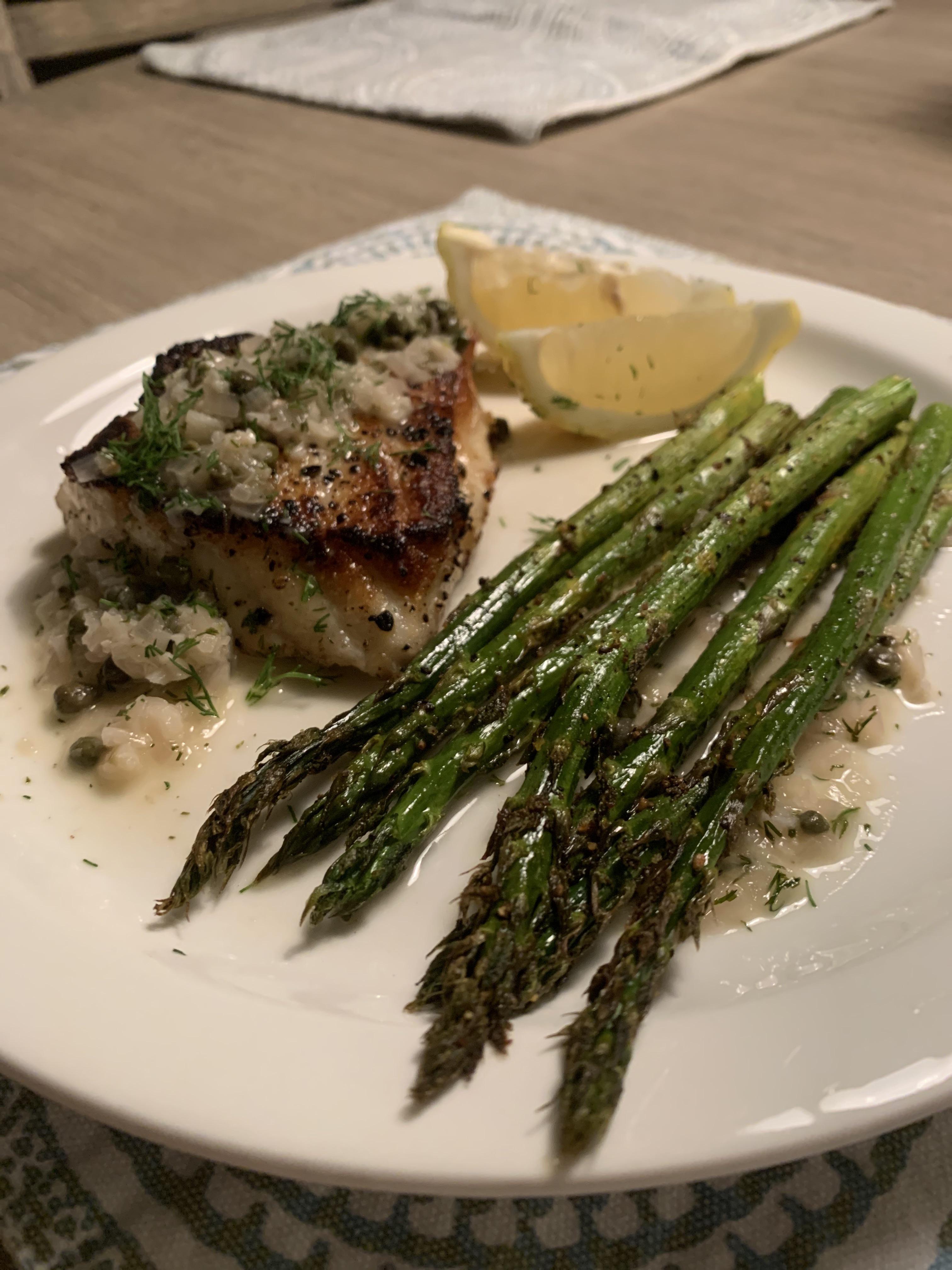 Pan seared Chilean Sea Bass with a shallot/garlic/dill butter sauce and