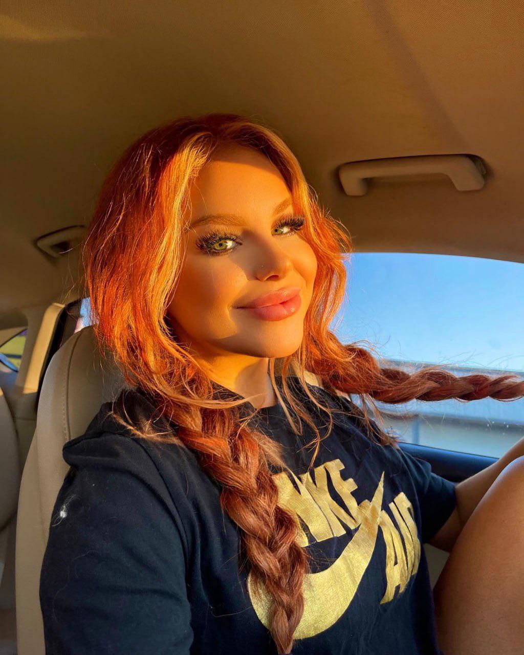 face of a redhead who loves her lil braids today : Faces