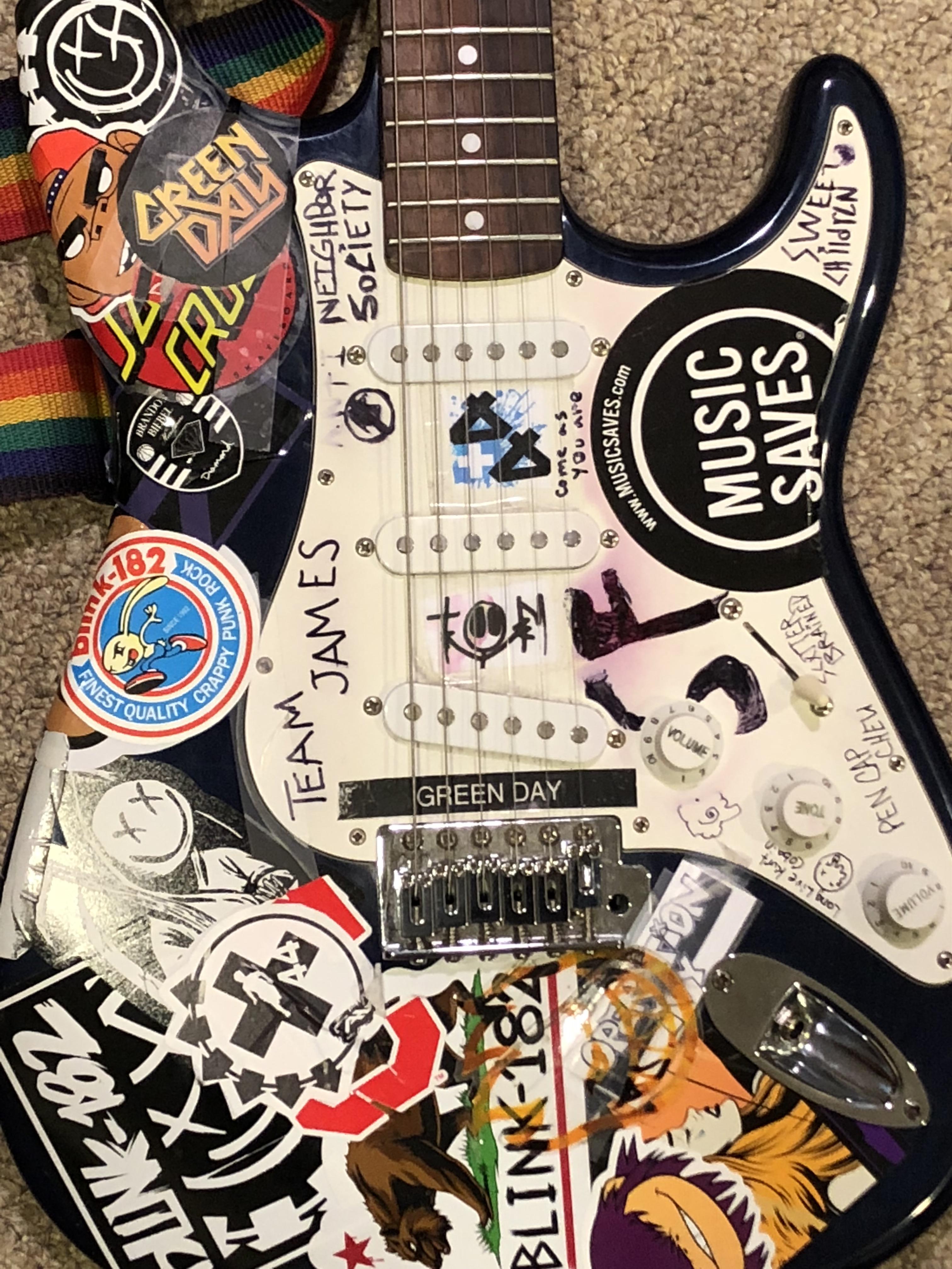 My first guitar (had a lot o blink stickers) r/Blink182