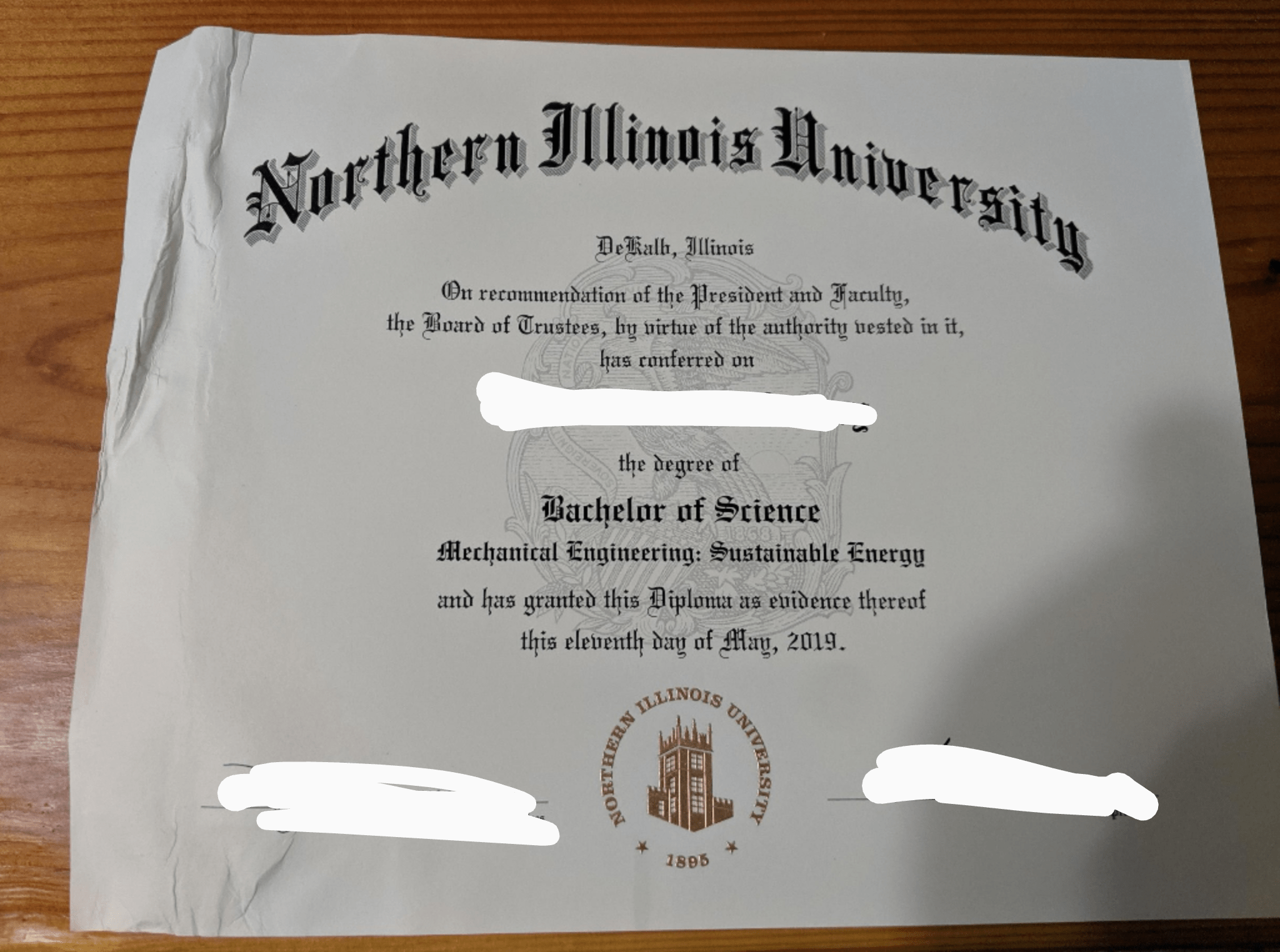Took me 5 years to get this diploma and USPS drops it in a puddle