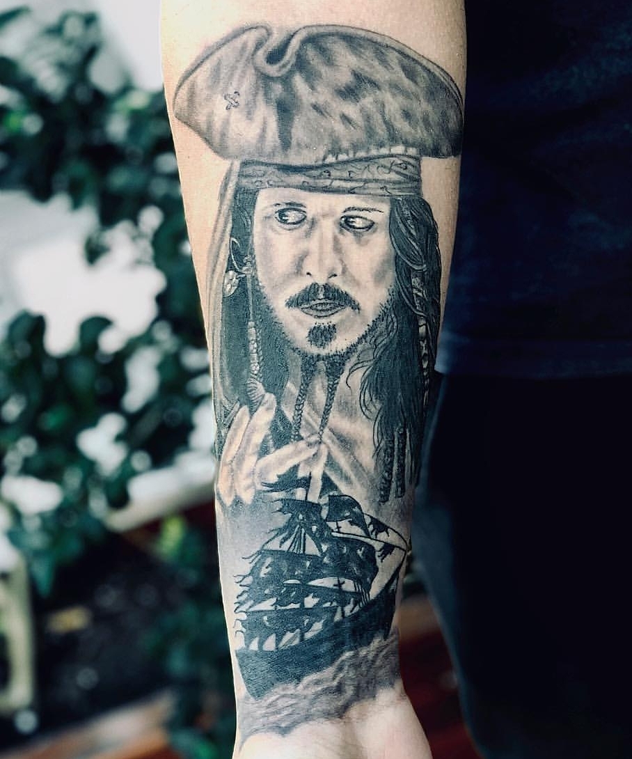 Shitty Jack Sparrow by a local tattoo parlor r/shittytattoos