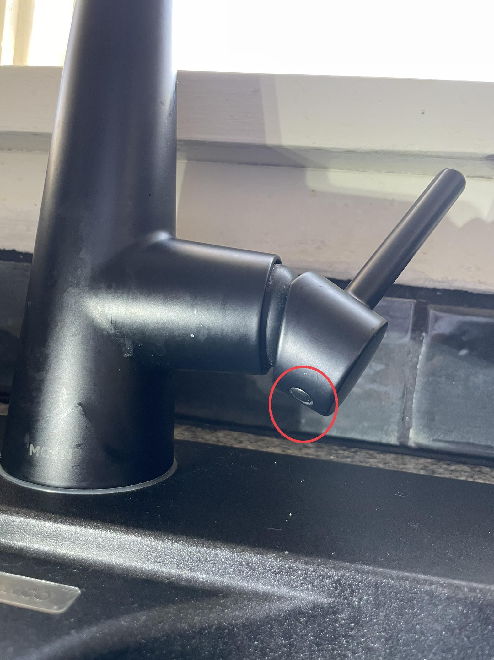 How do I fix a loose handle on this Moen onehandle kitchen faucet? How
