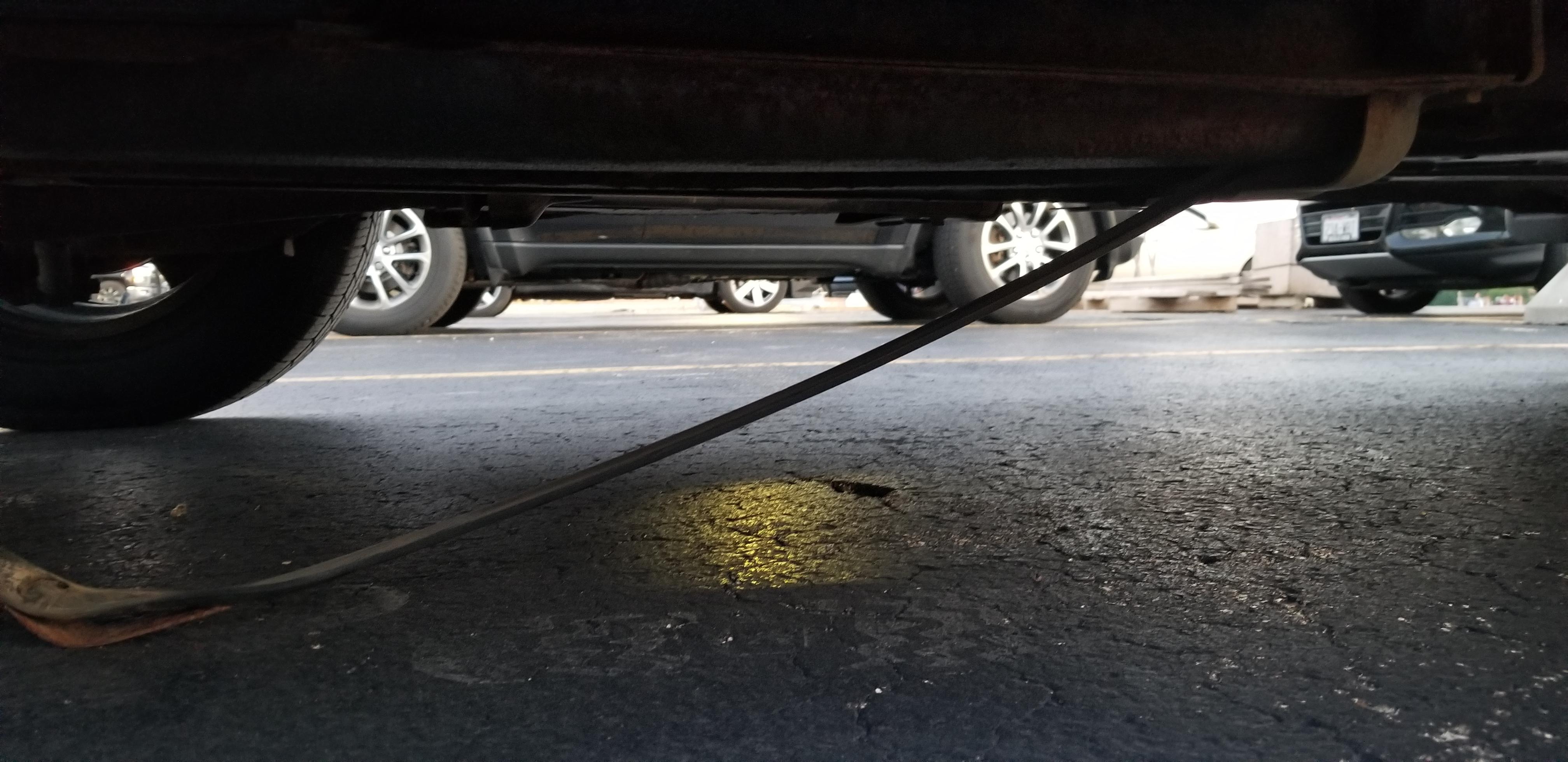 Metal rod came loose while driving, dragging underneath car (Toyota Rav