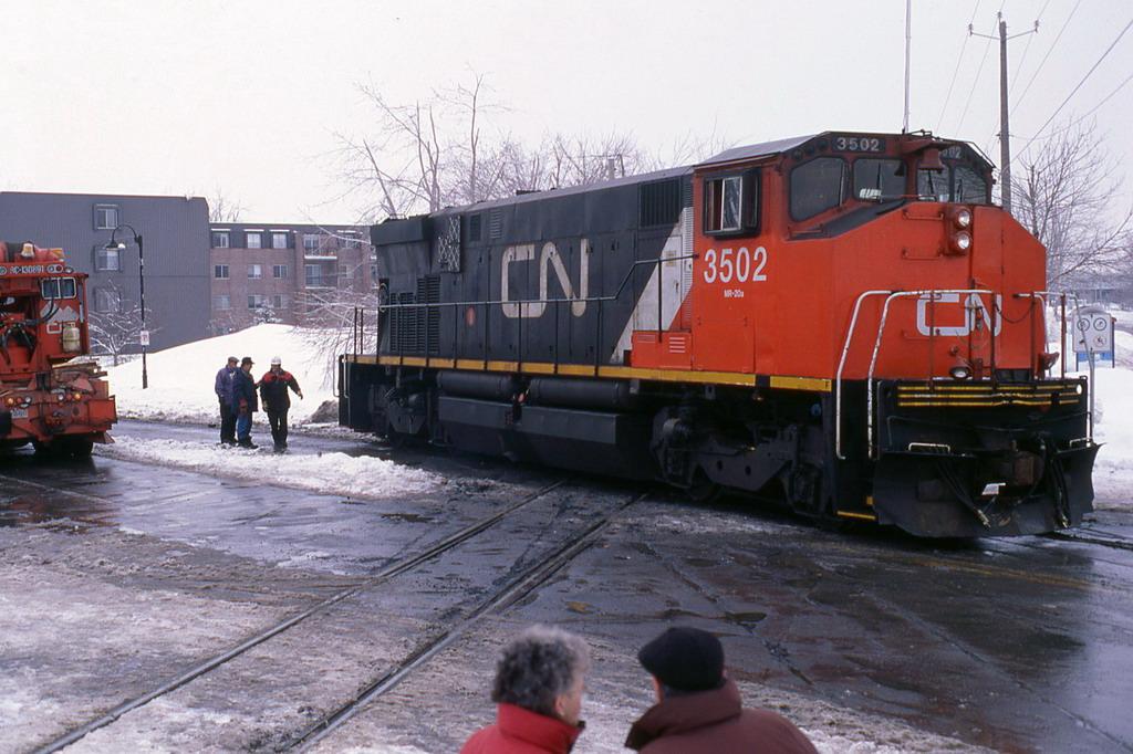 Canadian National M420W 3502 being rerailed after the city of