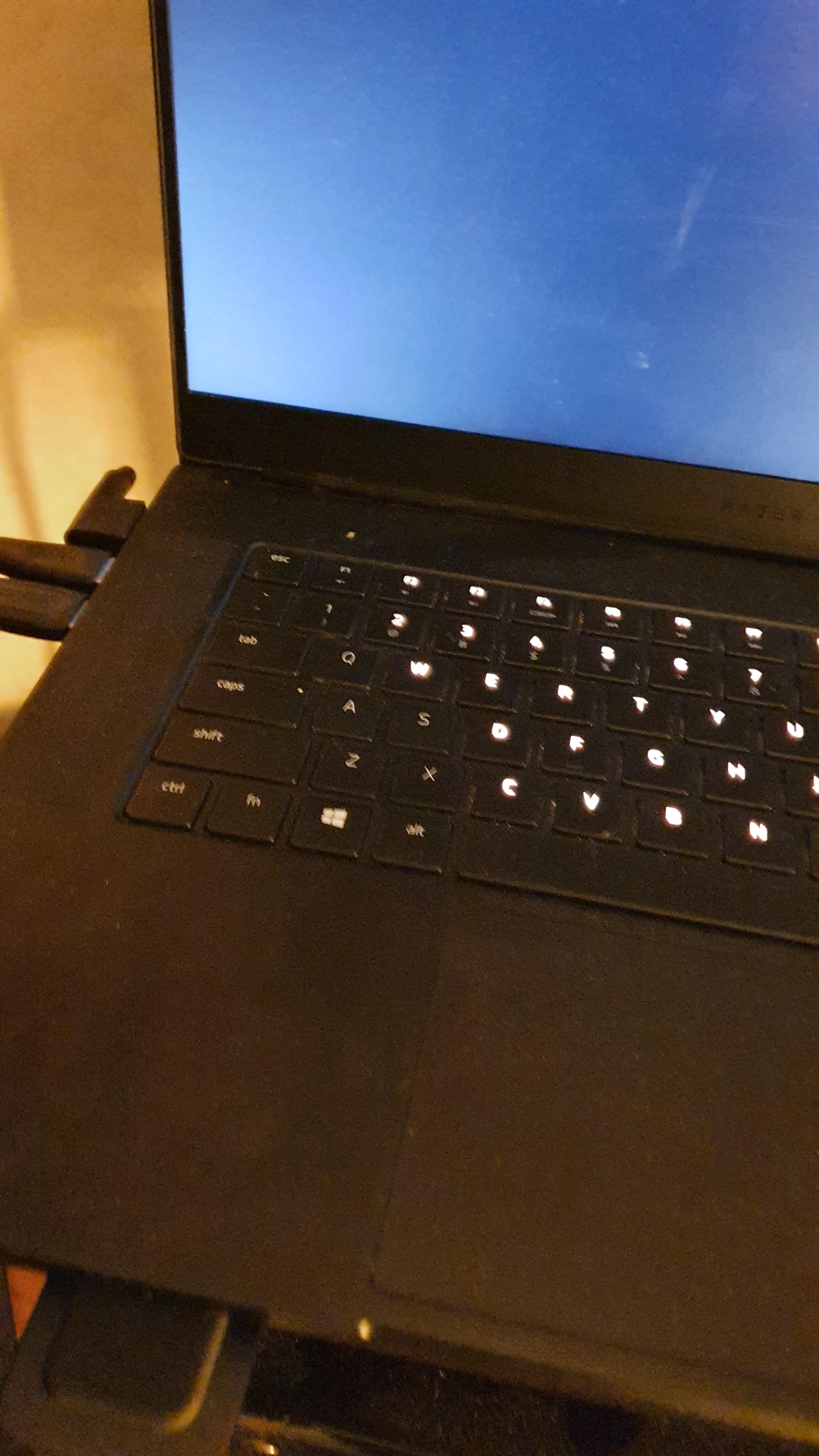 One corner of my laptop's keyboard won't light up. Razer support told