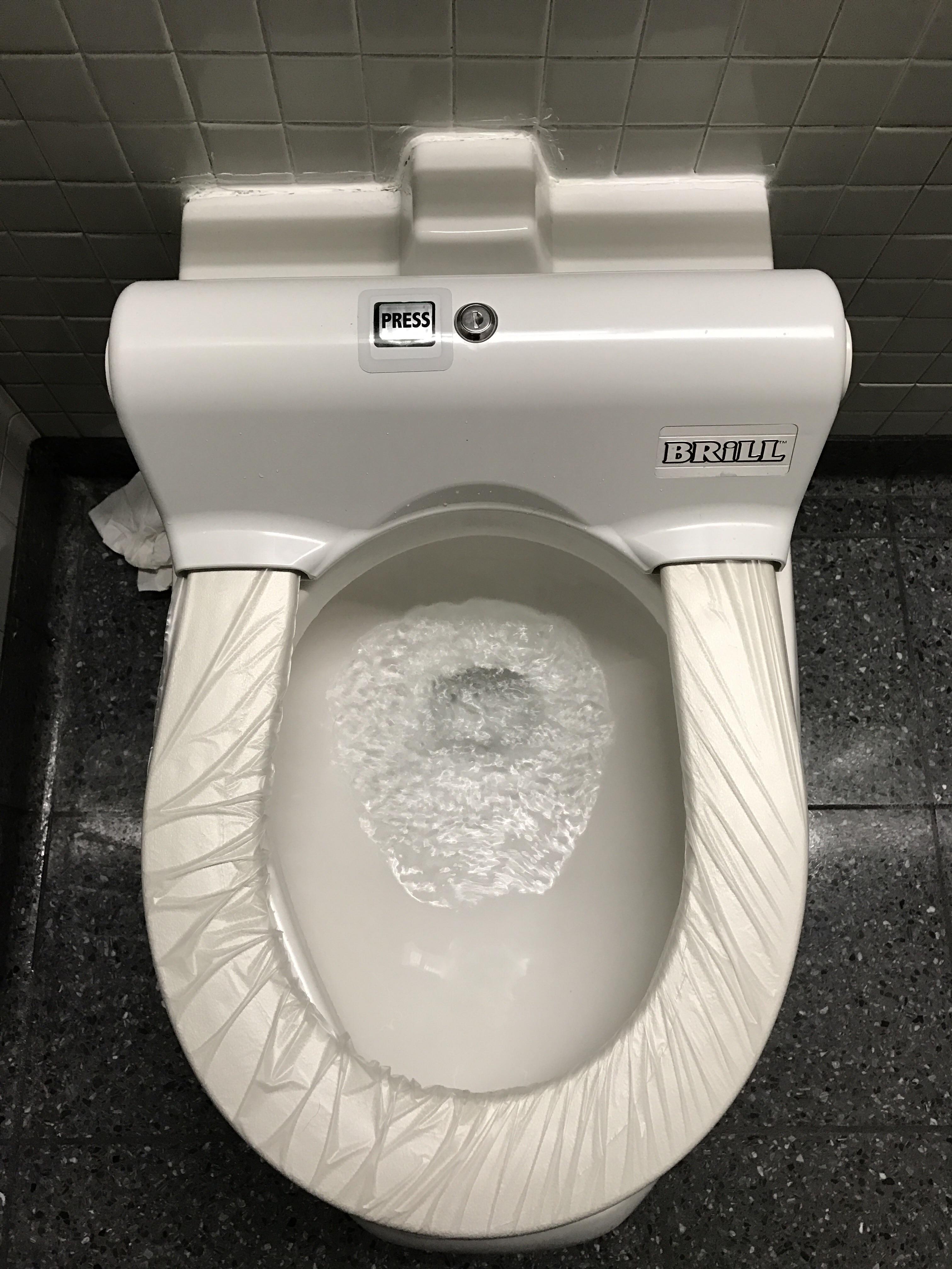 This self changing toilet cover at O'Hare airport r/mildlyinteresting