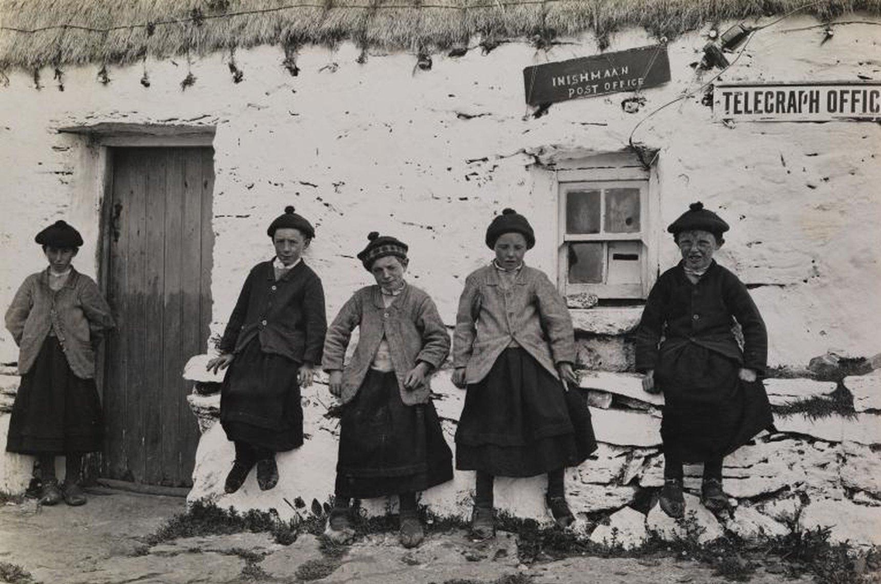 Schoolboys dressed in wool petticoats on Inishakra Island, Aran Islands