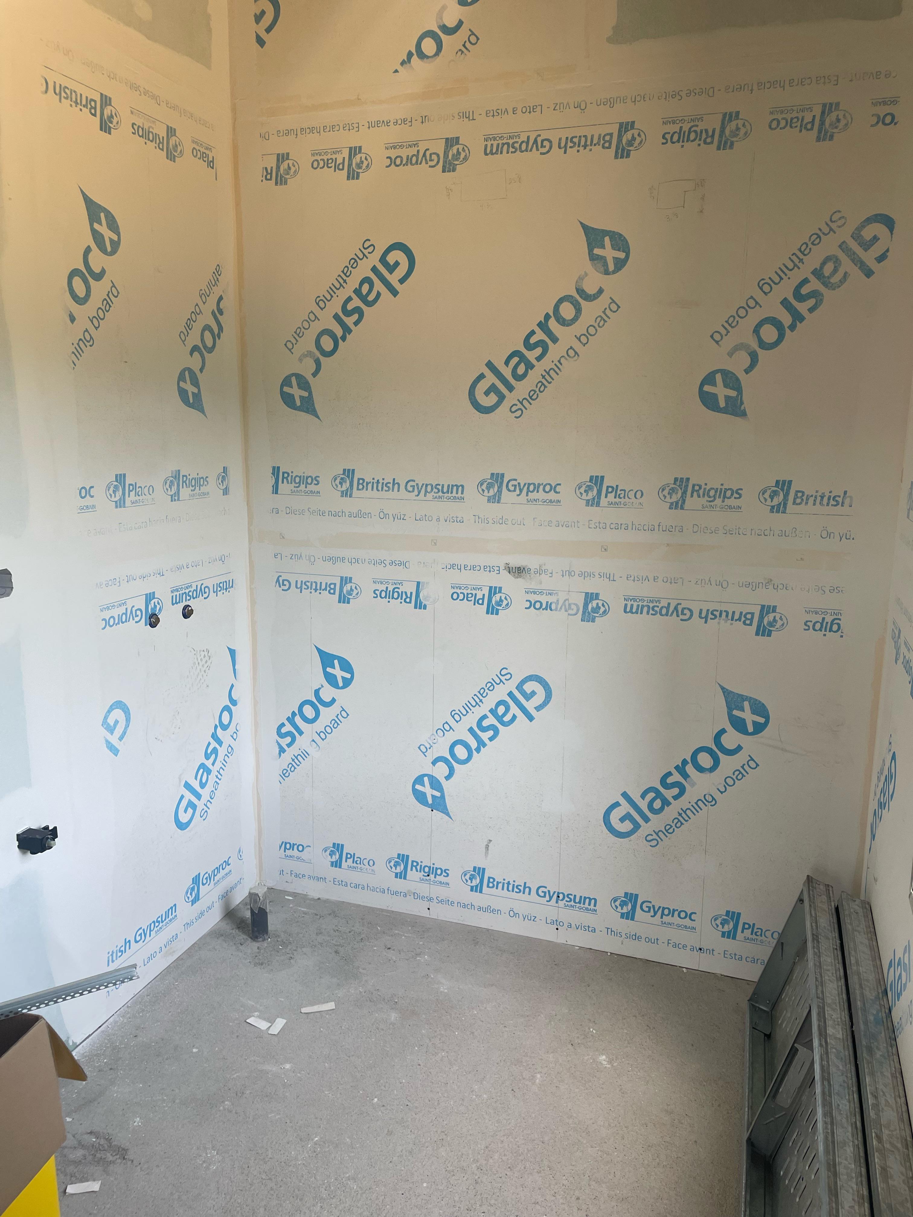 I had a tradesman install some gypsum boards for a shower. He installed the boards before the