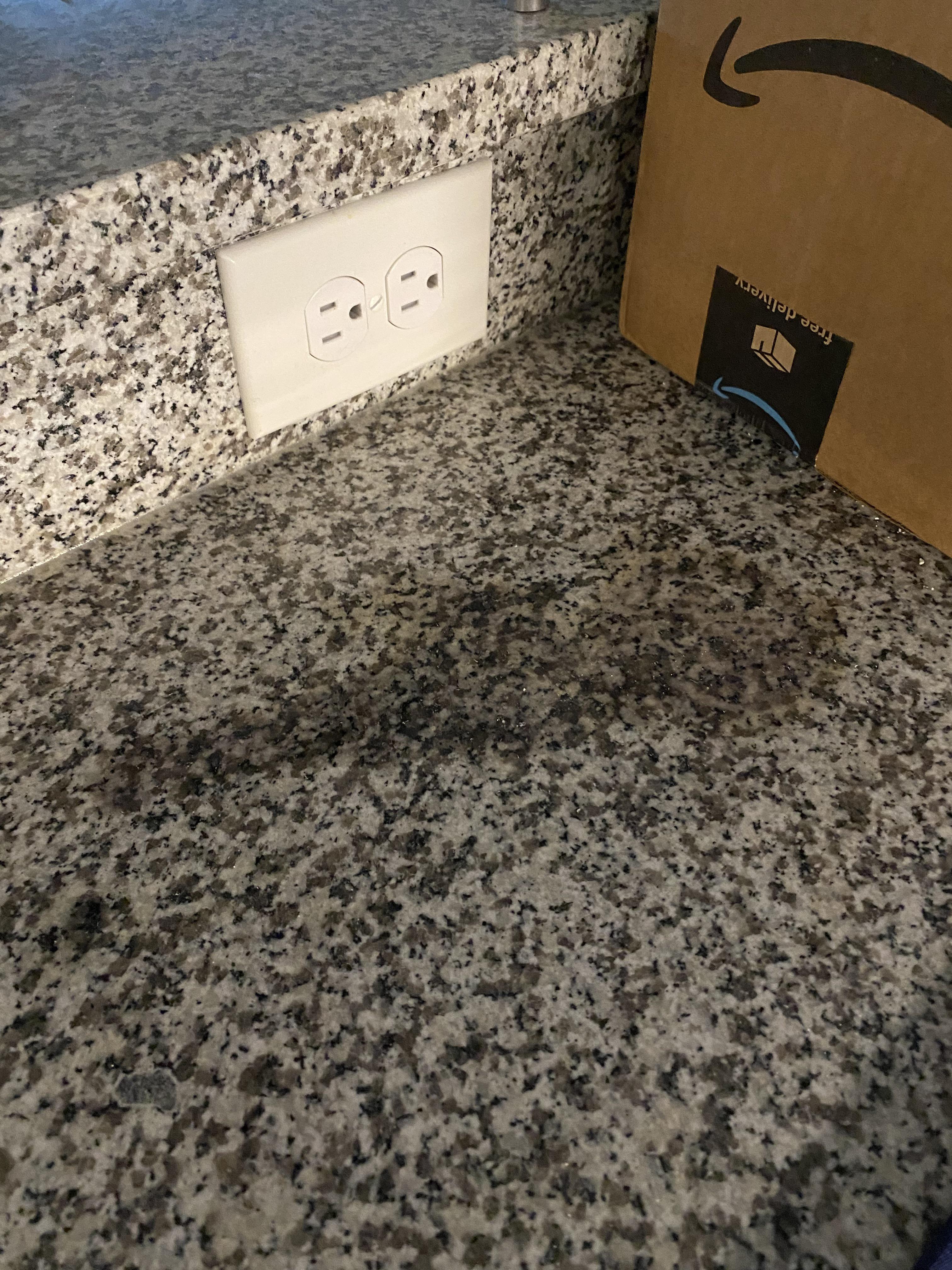 How do I possibly get black hair dye off my granite counters? I’m