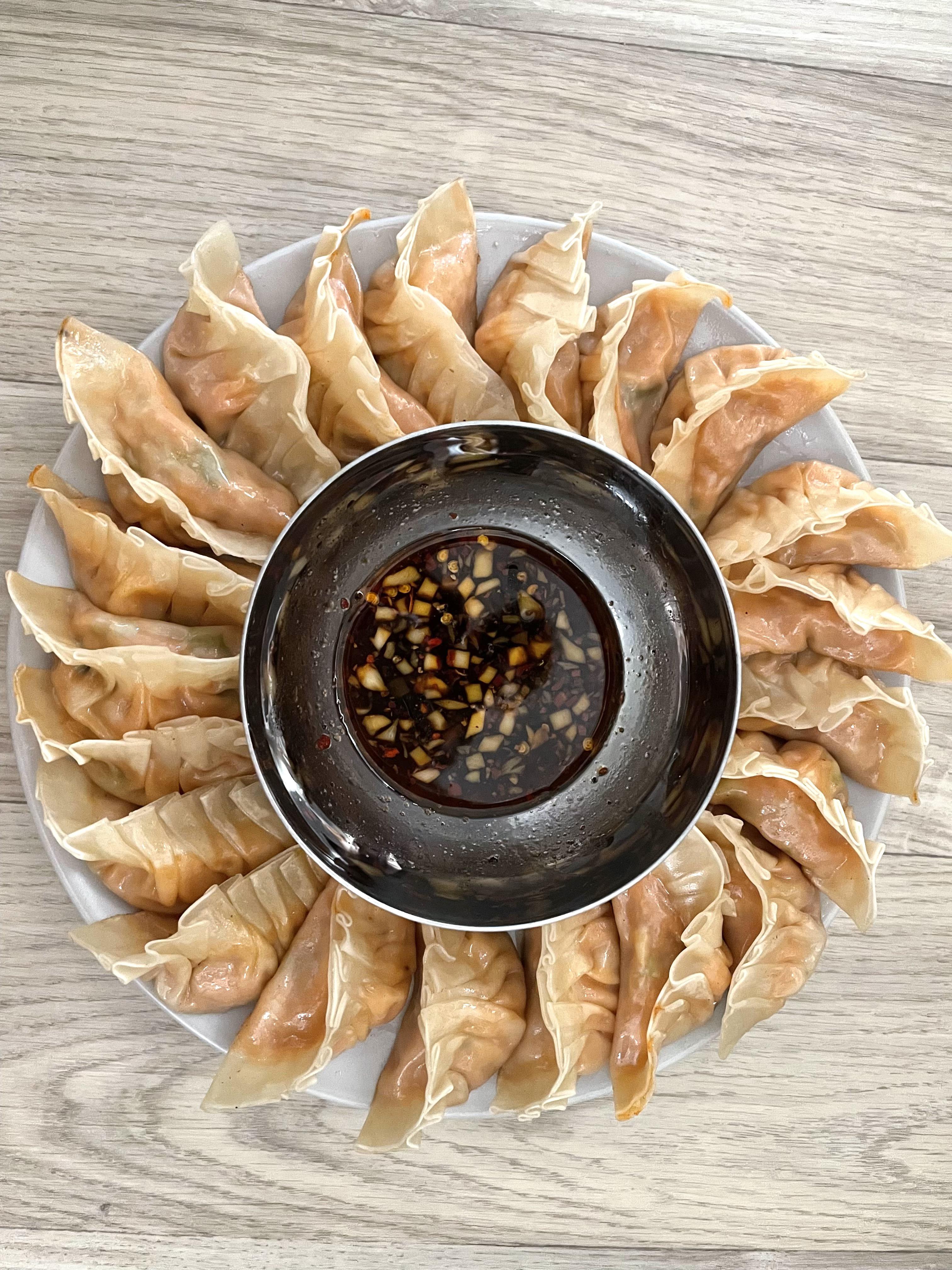 [Homemade] japanese gyozas with chili oil and soy sauce dip. r/food