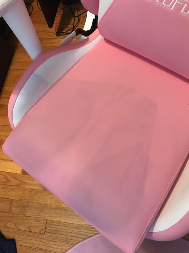 Stain from black sweatpants on PU leather gaming chair. I've tried