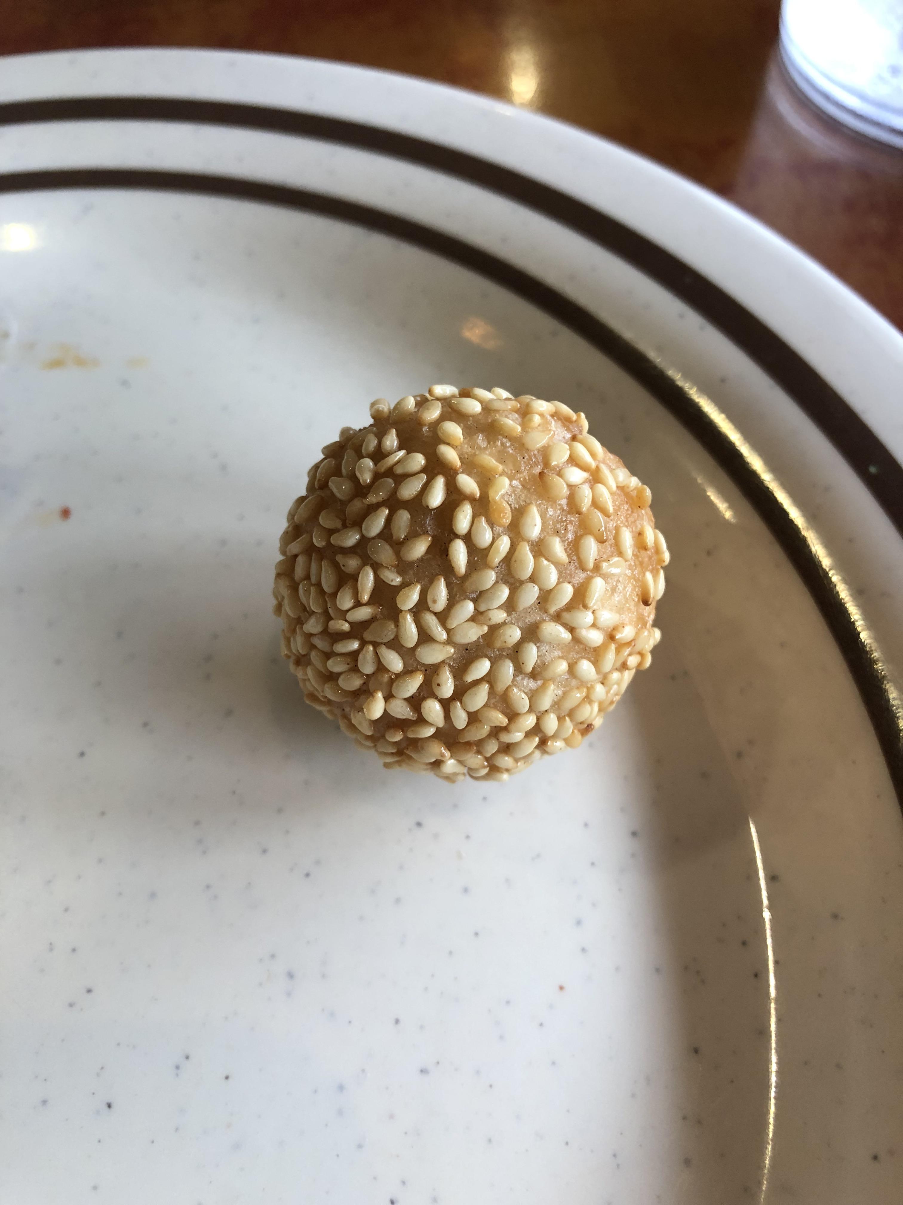 [I ate] Jian Dui Sesame seed covered fried rice flour ball filled with red bean paste. I was