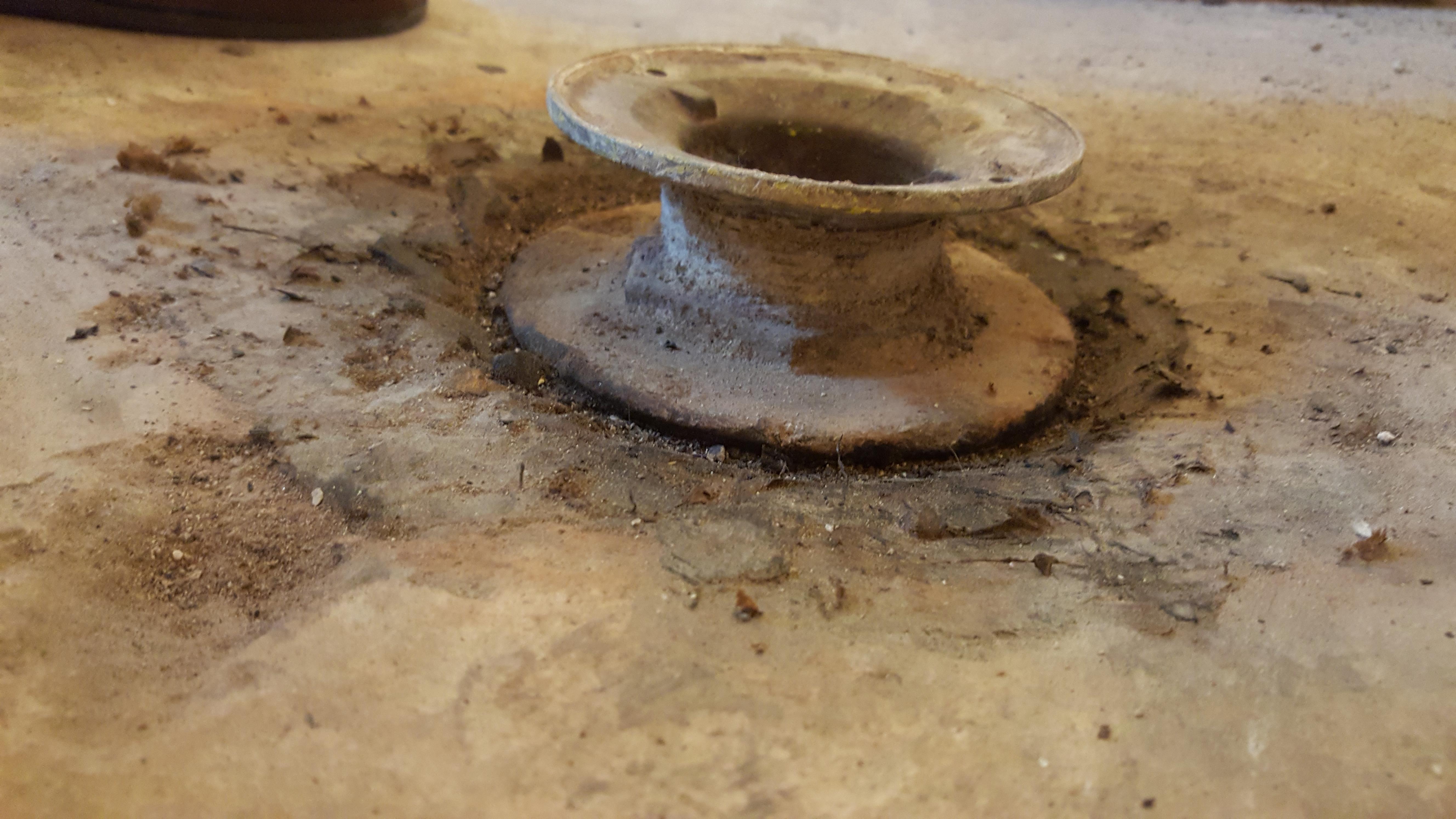 How to remove shower drain from concrete/cast iron pipe? (sorry upside