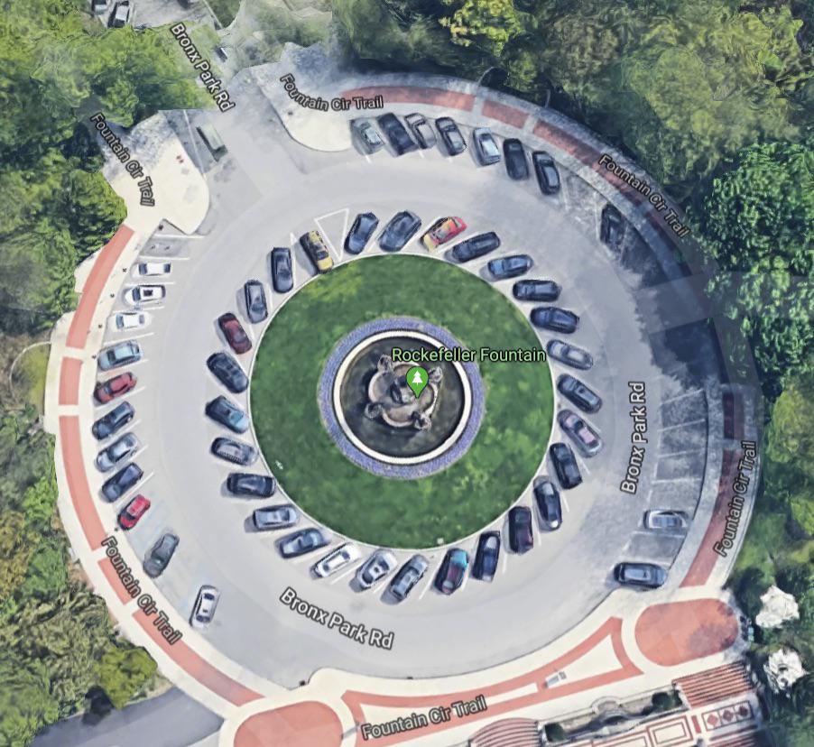 The one nonangled parking spot in this roundabout at the Bronx Zoo