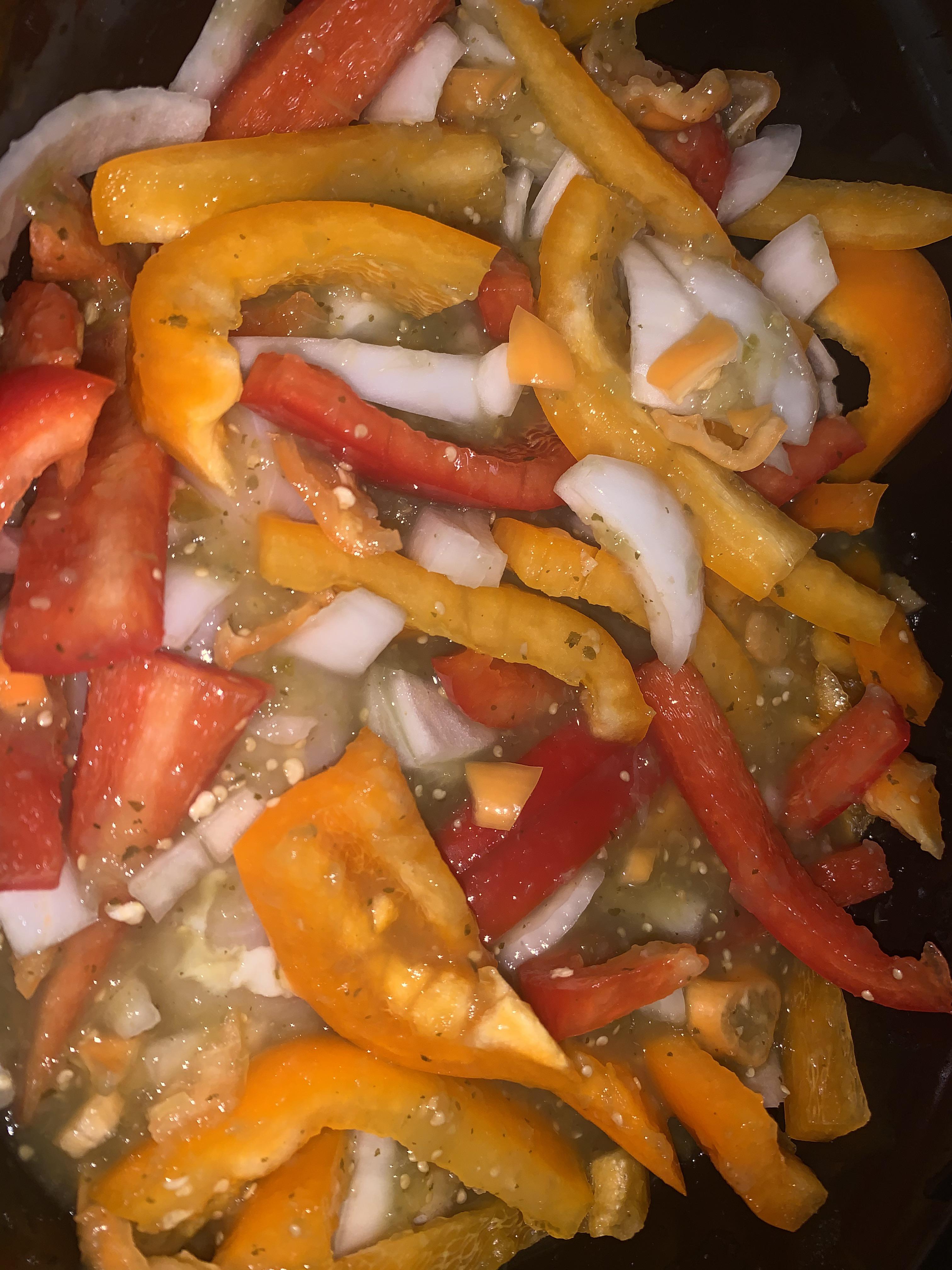 Chicken breast, bell peppers and spicy boi habaneros. Oh and some salsa