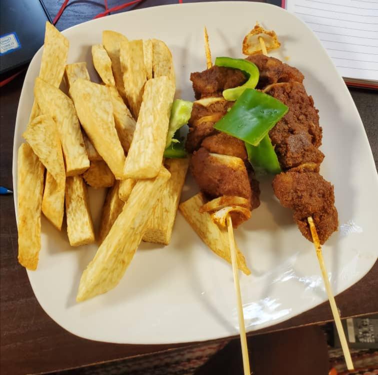 Fried yams and khebab Labadi, Ghana r/streeteats