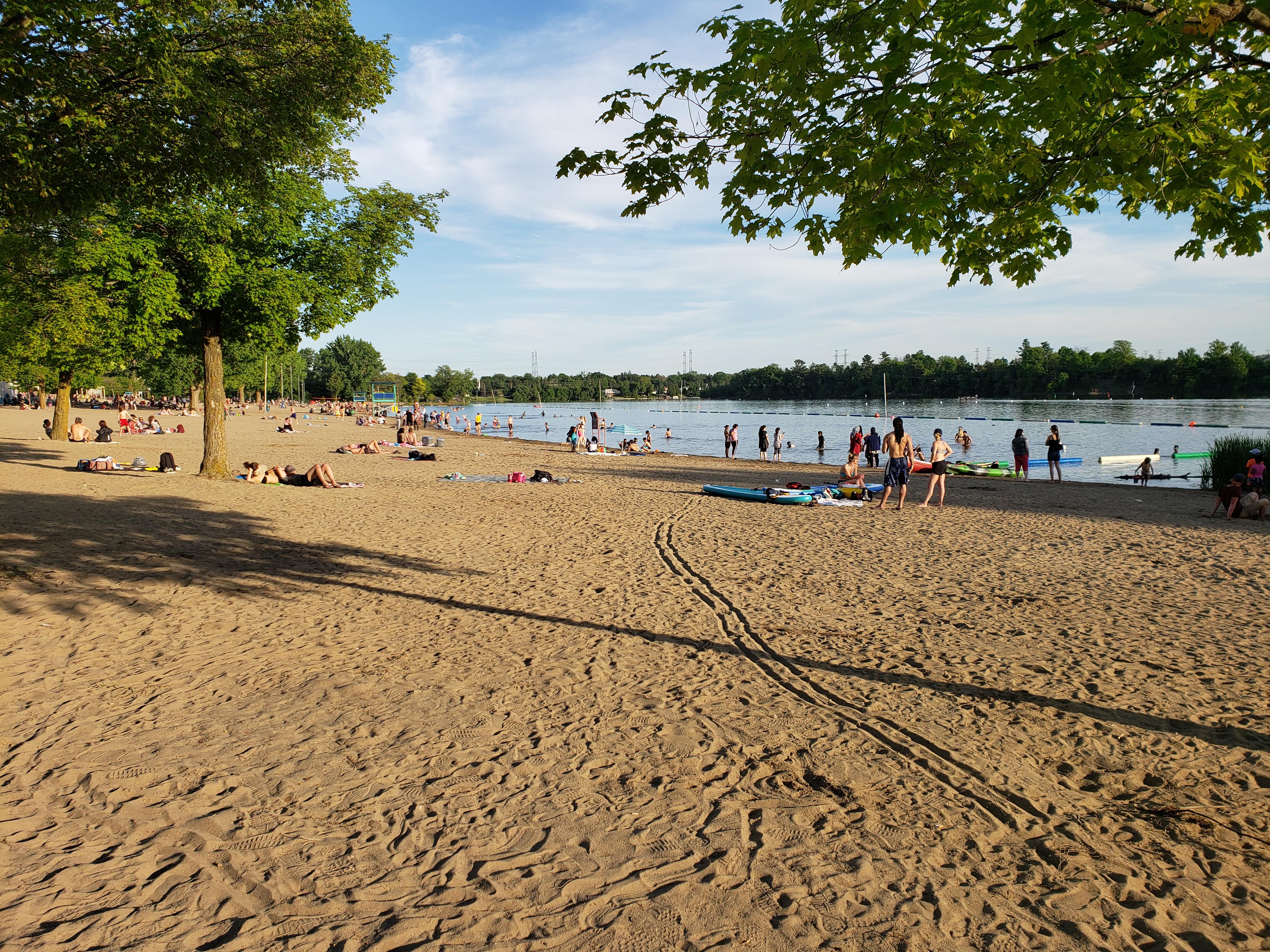 Glorious day for riverside R&R at Mooney's Bay r/ottawa