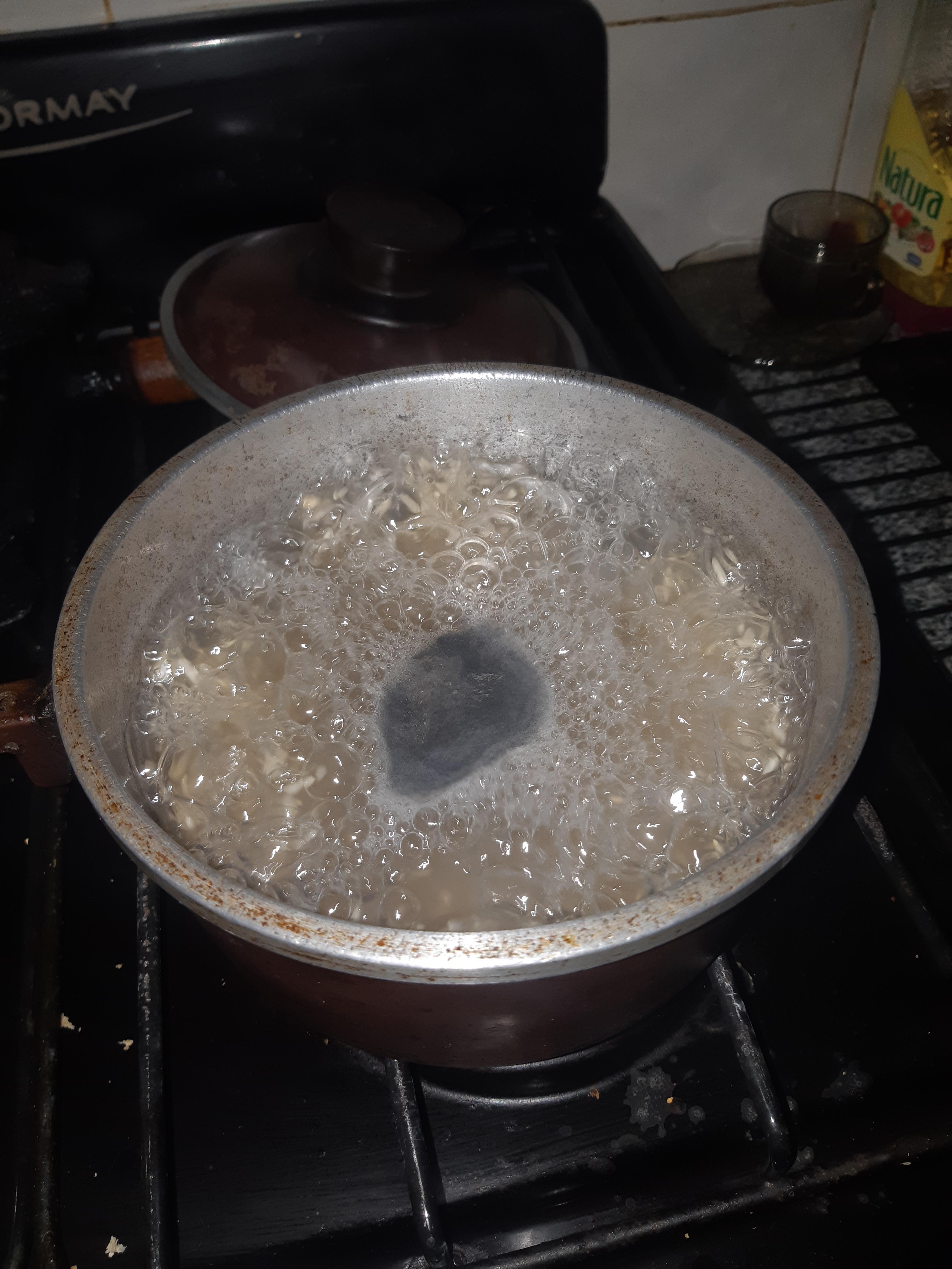 So I was cooking Integral rice, and this sort of dark grey foam began